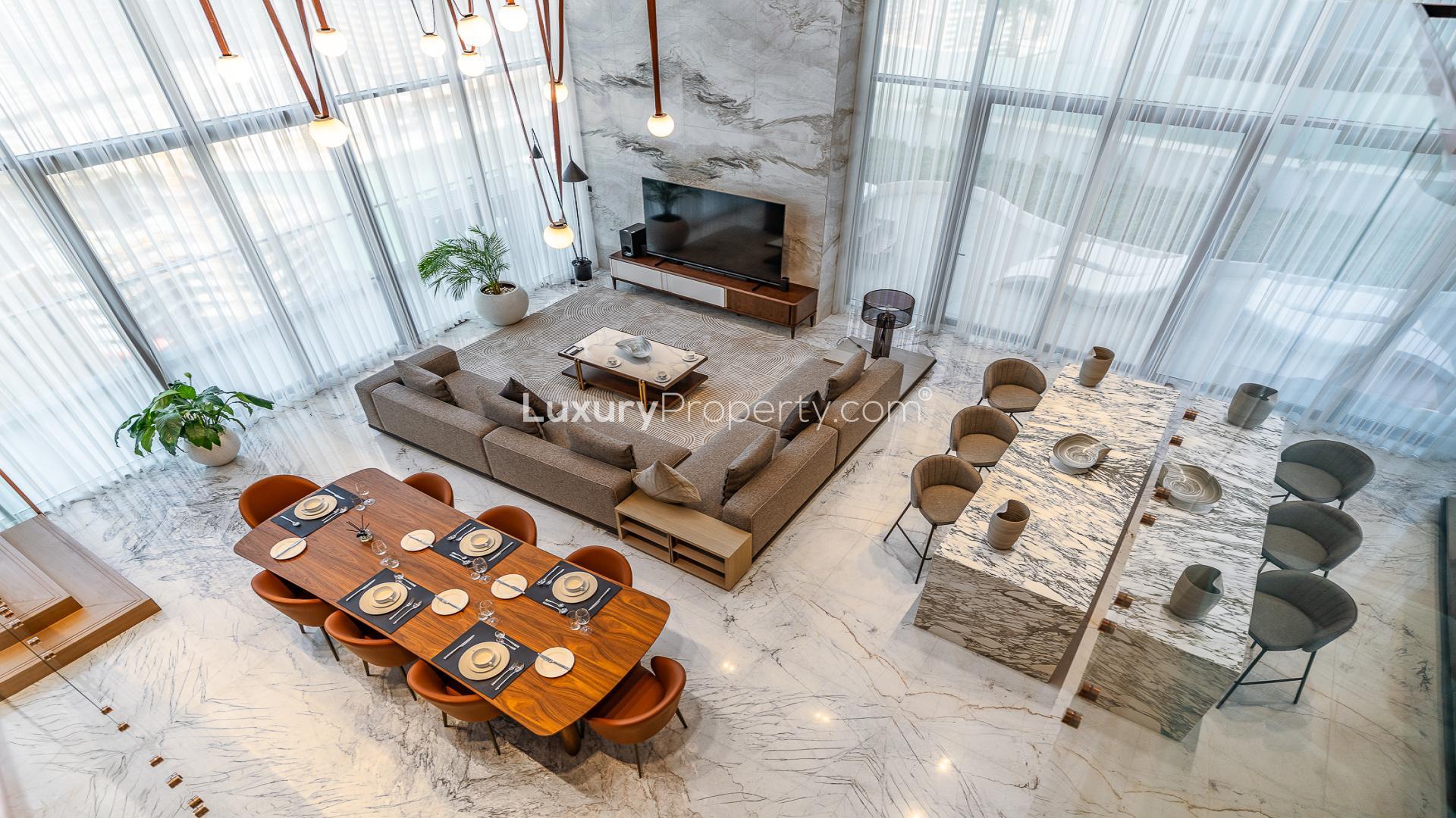 Luxurious Business Bay penthouse interior with modern design, marble finishes, and elegant staircase