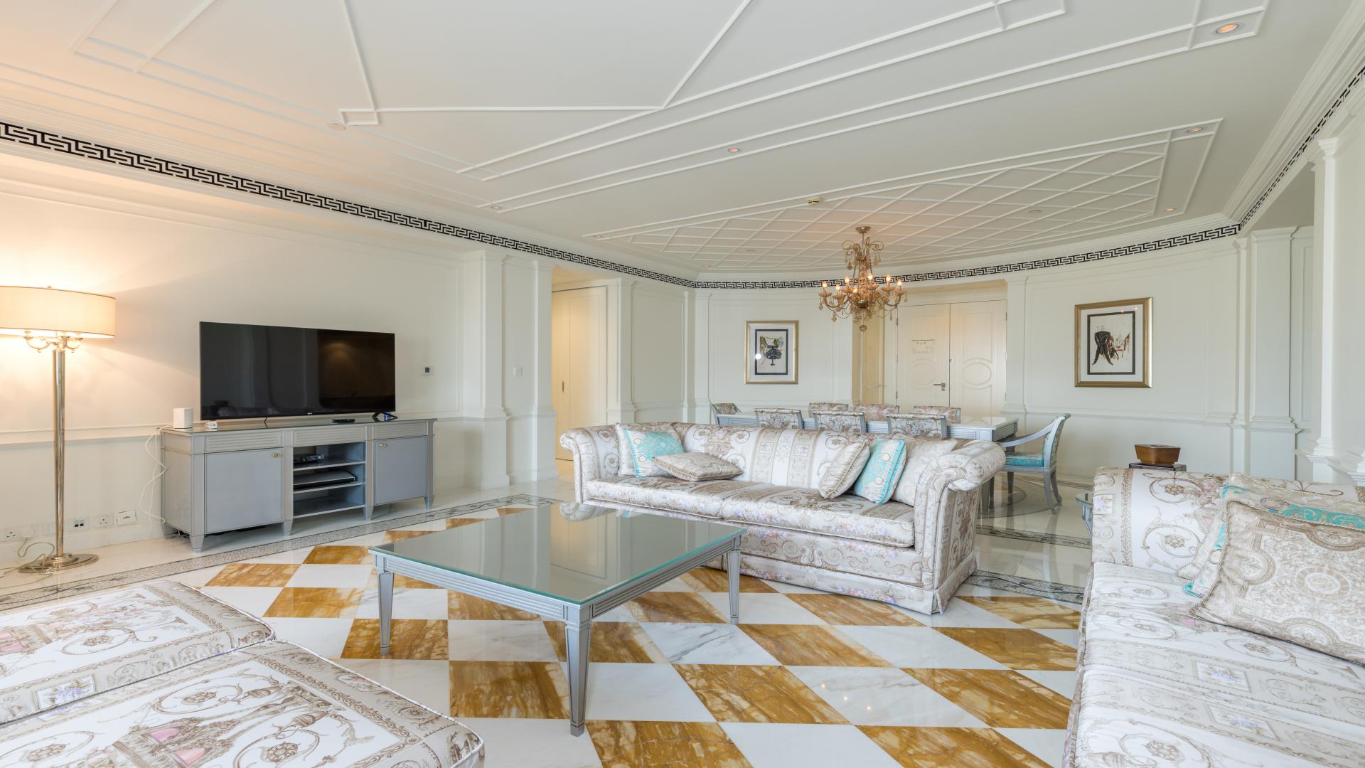 "Luxurious penthouse with private pool at Palazzo Versace, Culture Village, for rent.",Luxurious living room in 4-bedroom penthouse, Palazzo Versace, Culture Village, elegant decor