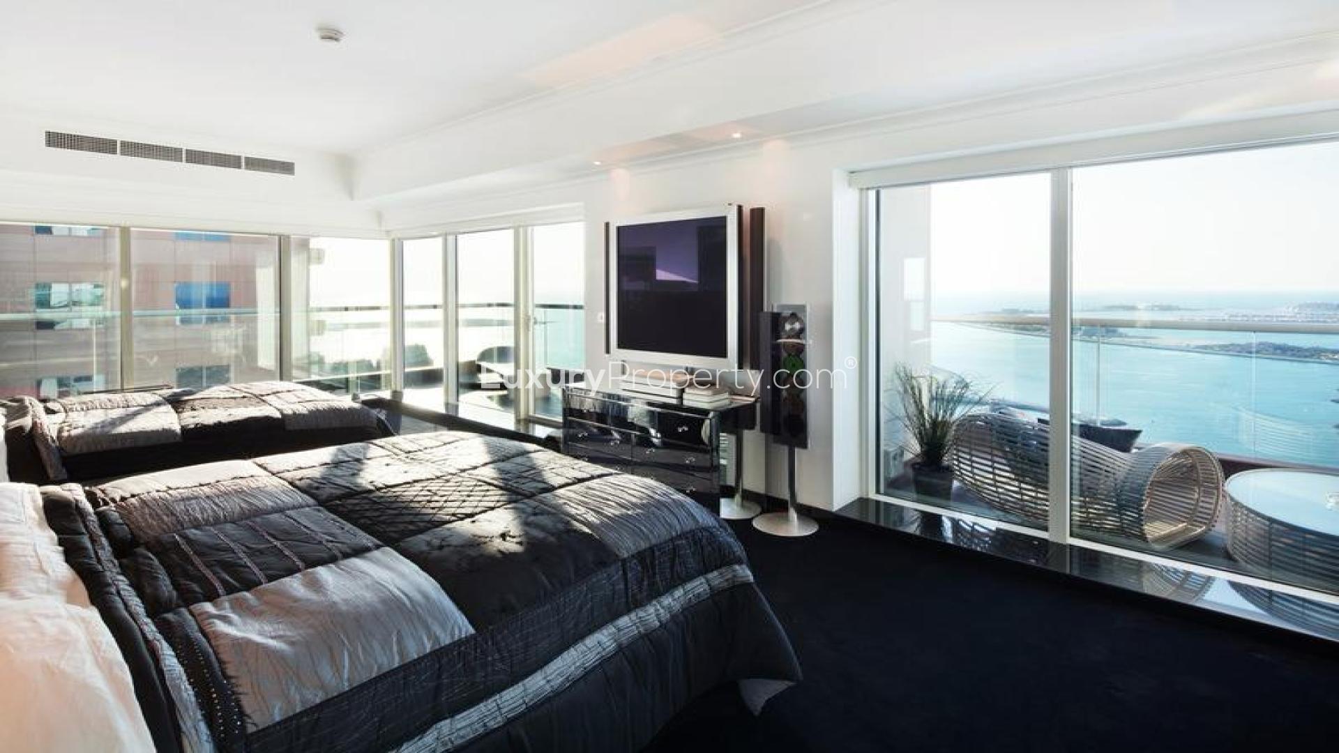 Luxurious Dubai Marina penthouse living room with sea views and elegant furnishings