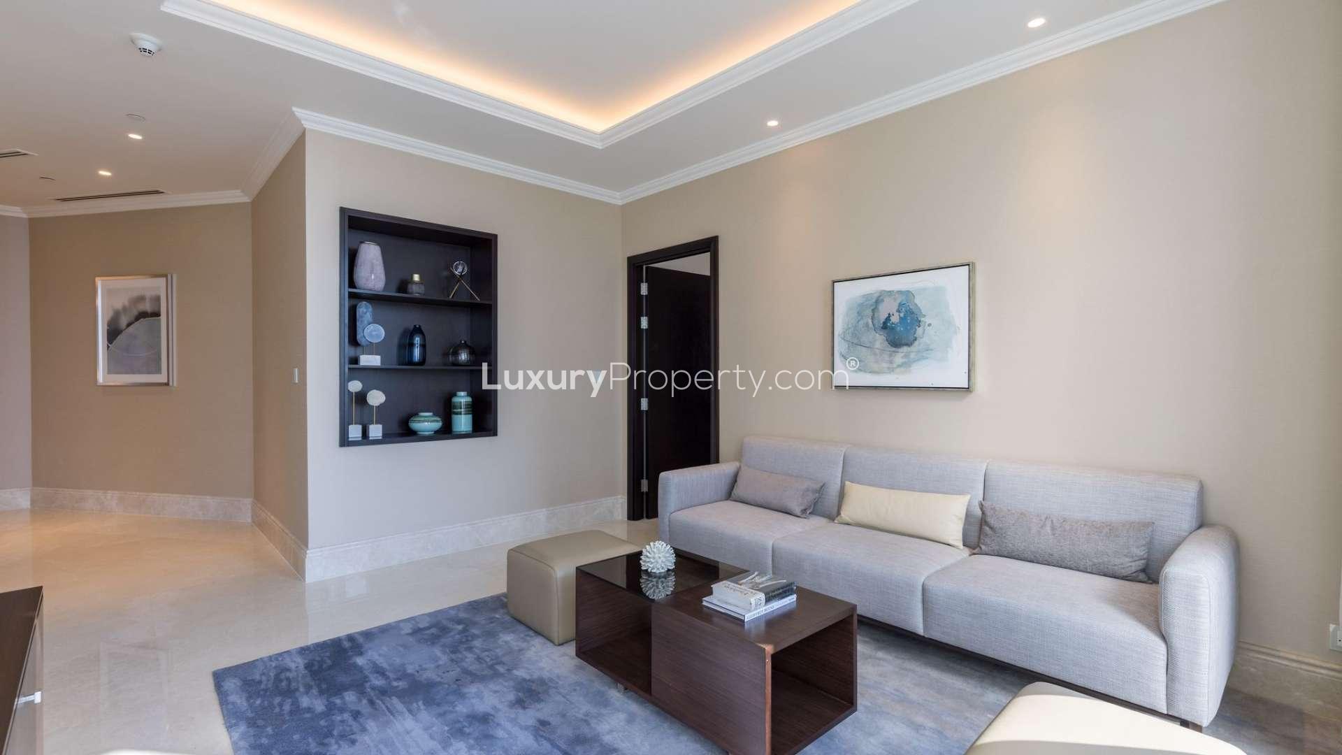 Modern living room in Downtown Dubai penthouse, featuring elegant seating and contemporary decor