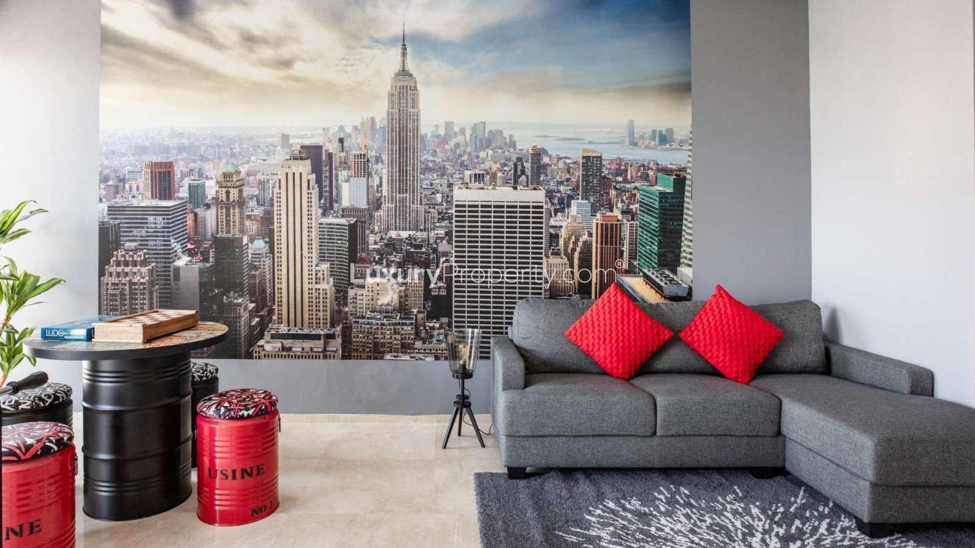 Modern kitchen in Dubai Marina penthouse, featuring sleek cabinets and city views