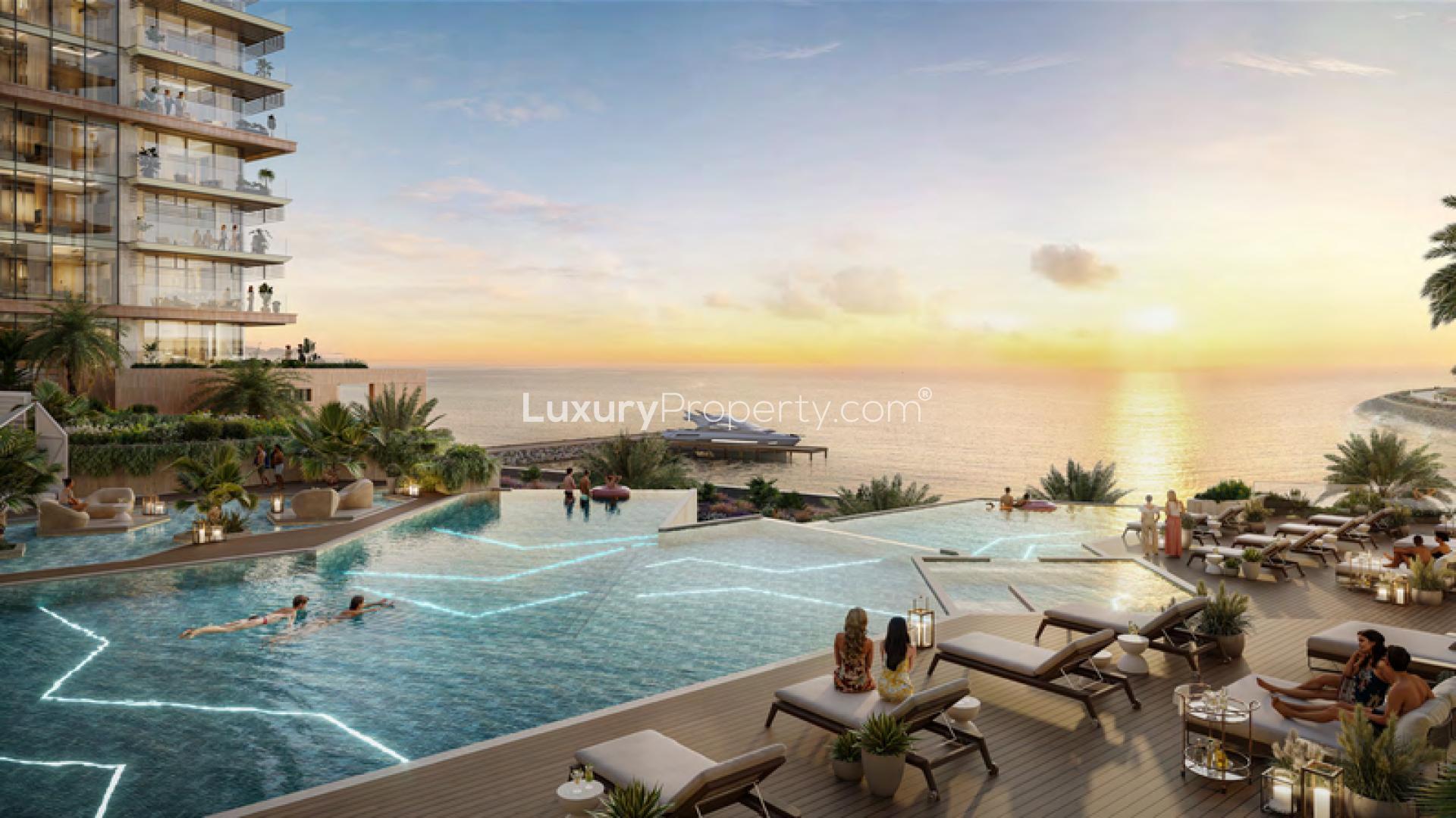 Luxurious penthouse courtyard with lush greenery and water feature at Al Marjan Island