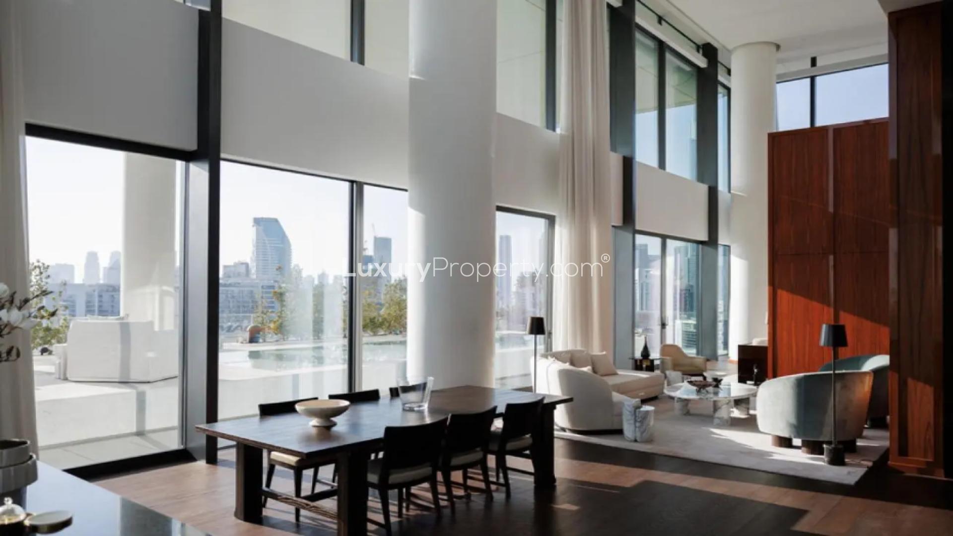 Luxurious Dorchester Collection penthouse living room with floor-to-ceiling windows in Business Bay