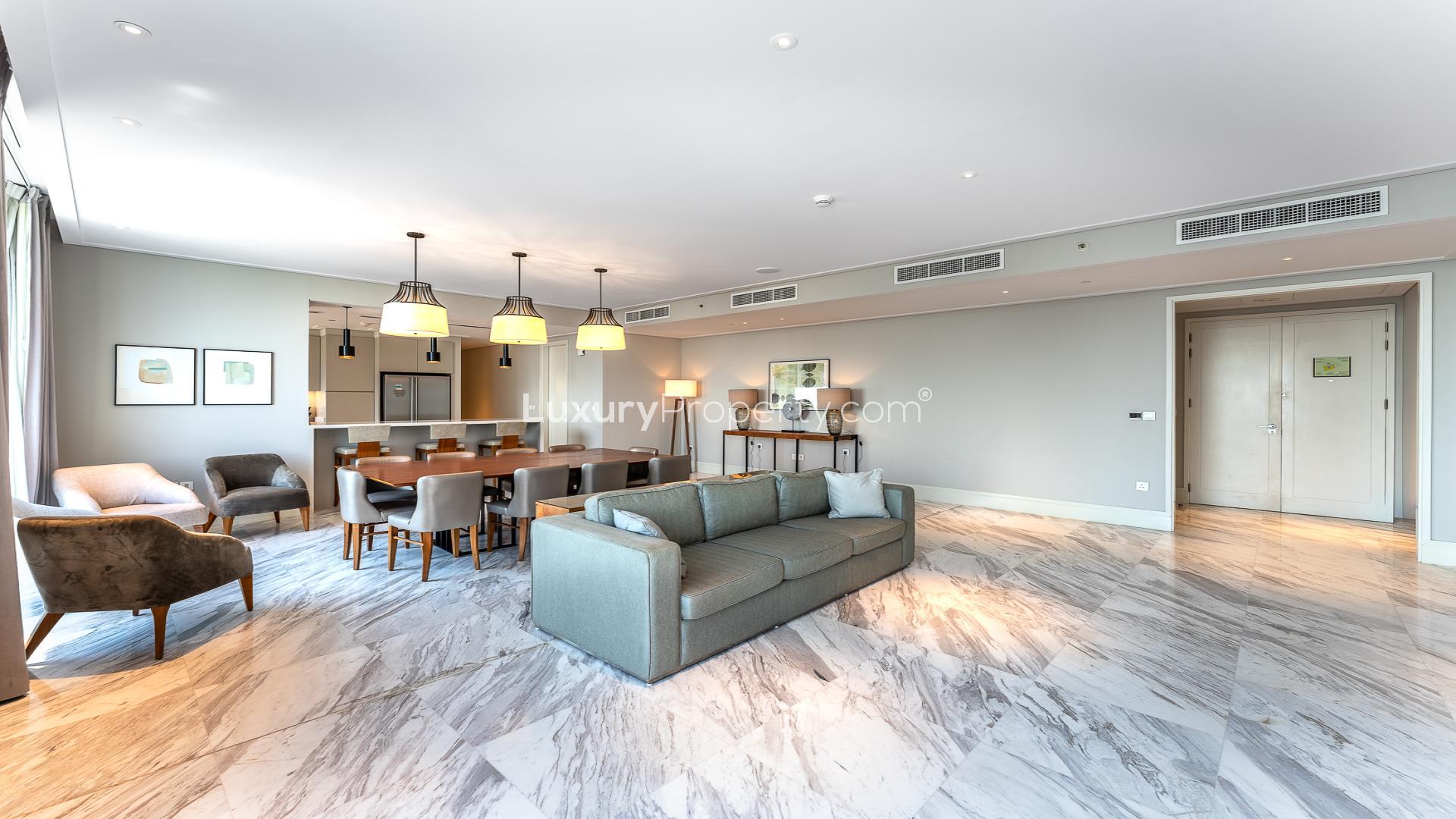 Modern living and dining area in vacant Downtown Dubai penthouse, Avida Residences
