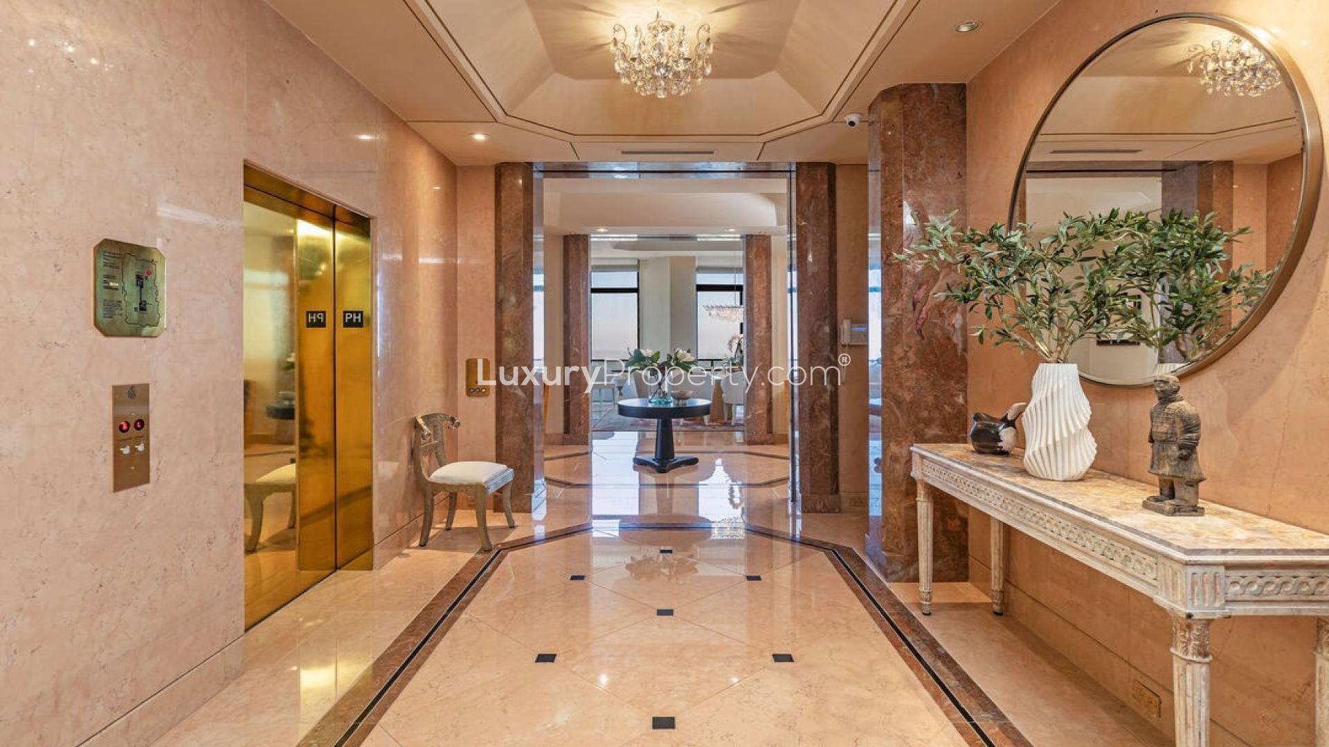 Luxurious Los Angeles penthouse living room with grand piano and spiral staircase