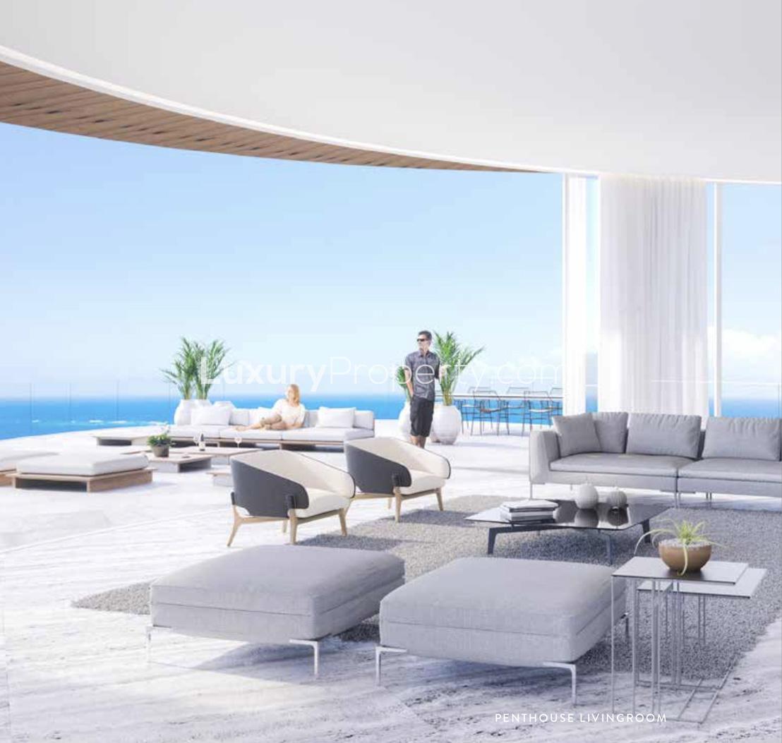 Penthouse in Ayia Napa Marina with ocean views, pool, and palm trees at sunset