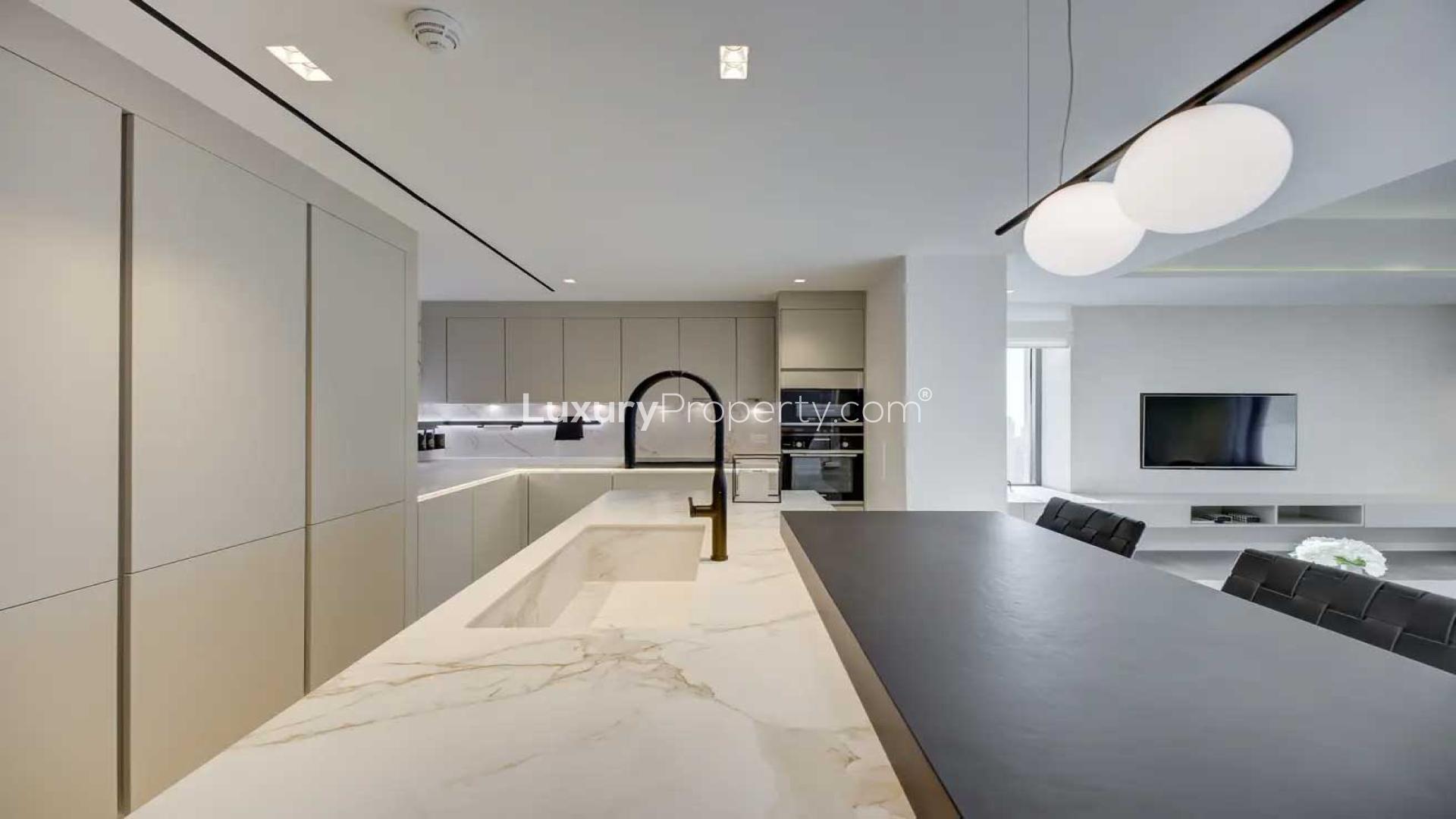 Modern living room in Jumeirah Beach Residence penthouse, open layout with stylish decor