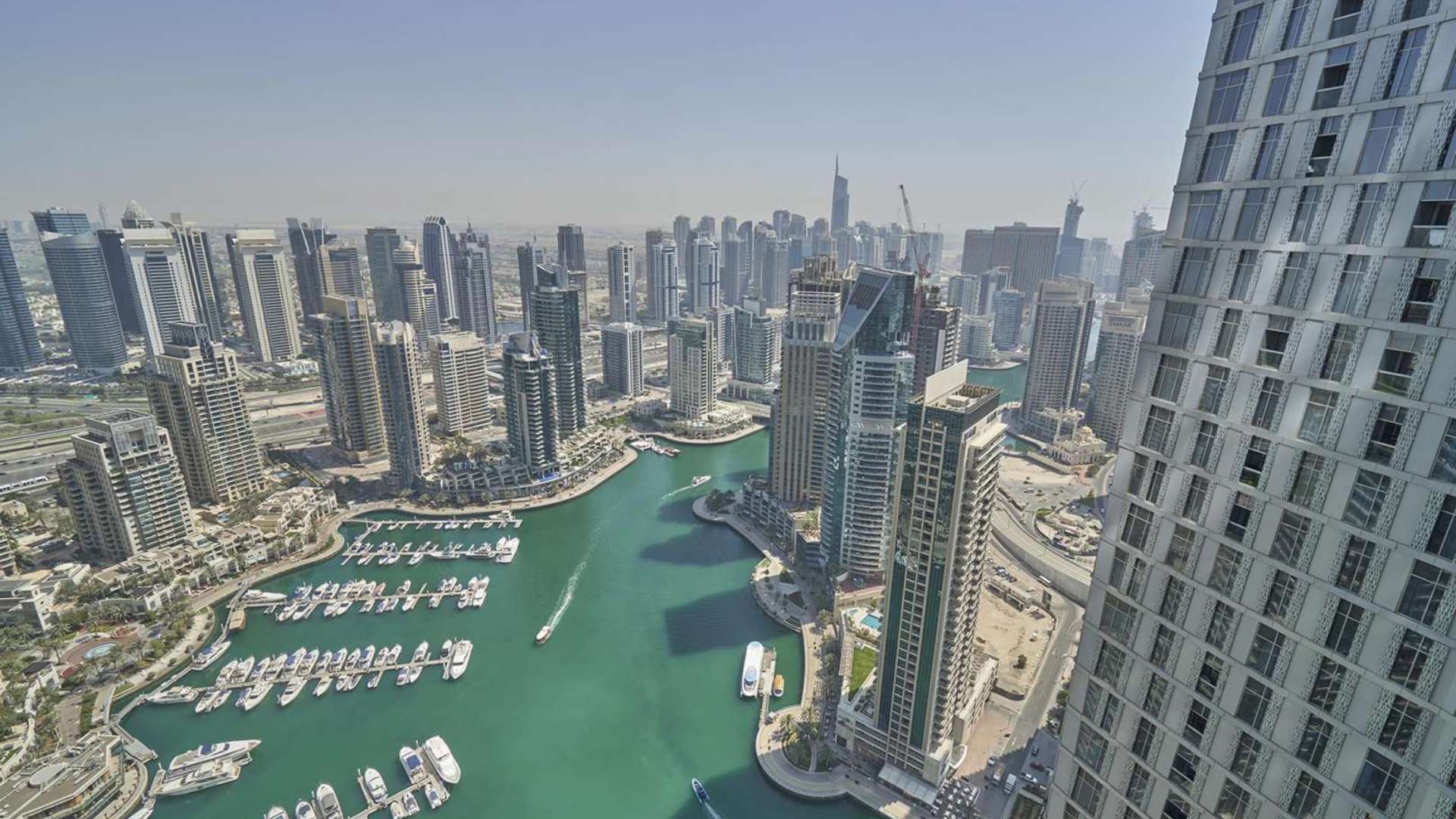 Aerial view from Dubai Marina penthouse overlooking marina and Atlantis, Damac Heights