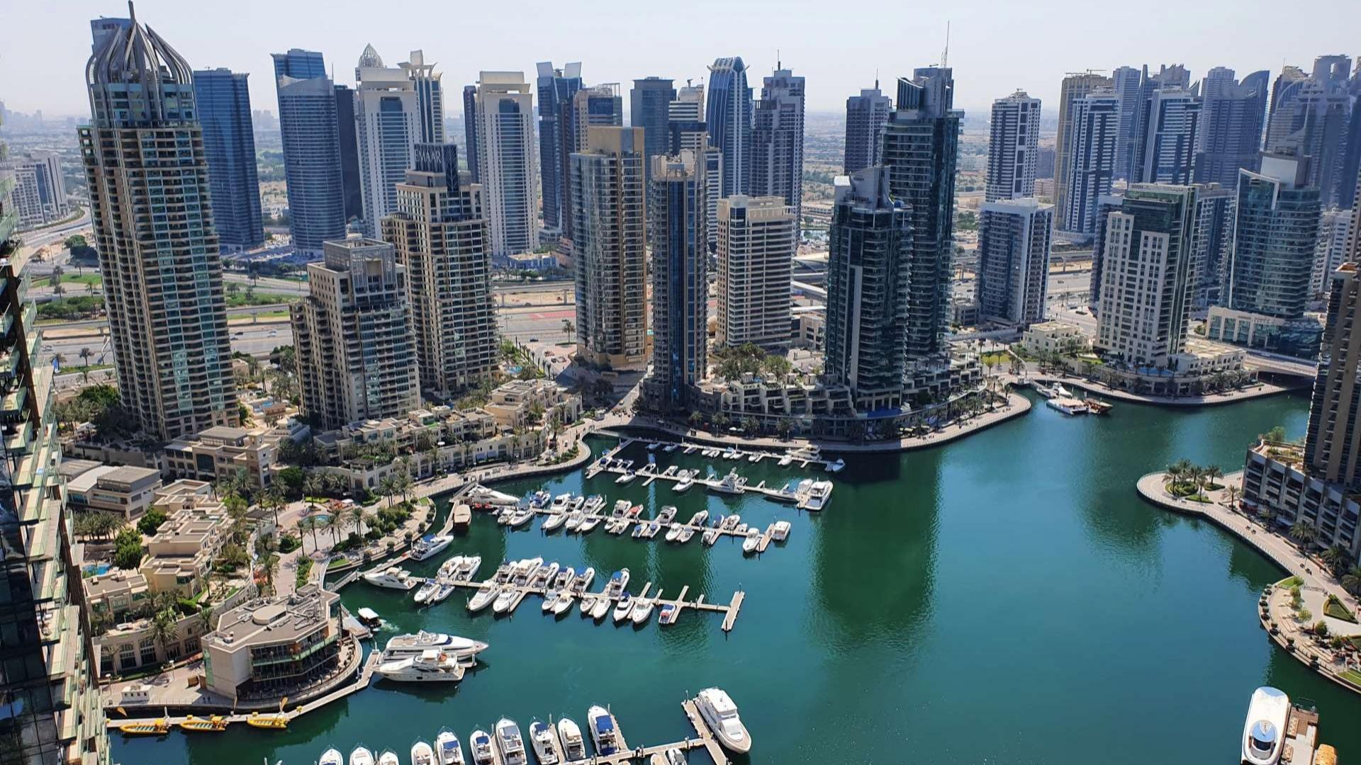 Aerial view of Dubai Marina and Palm Jumeirah from Damac Heights penthouse