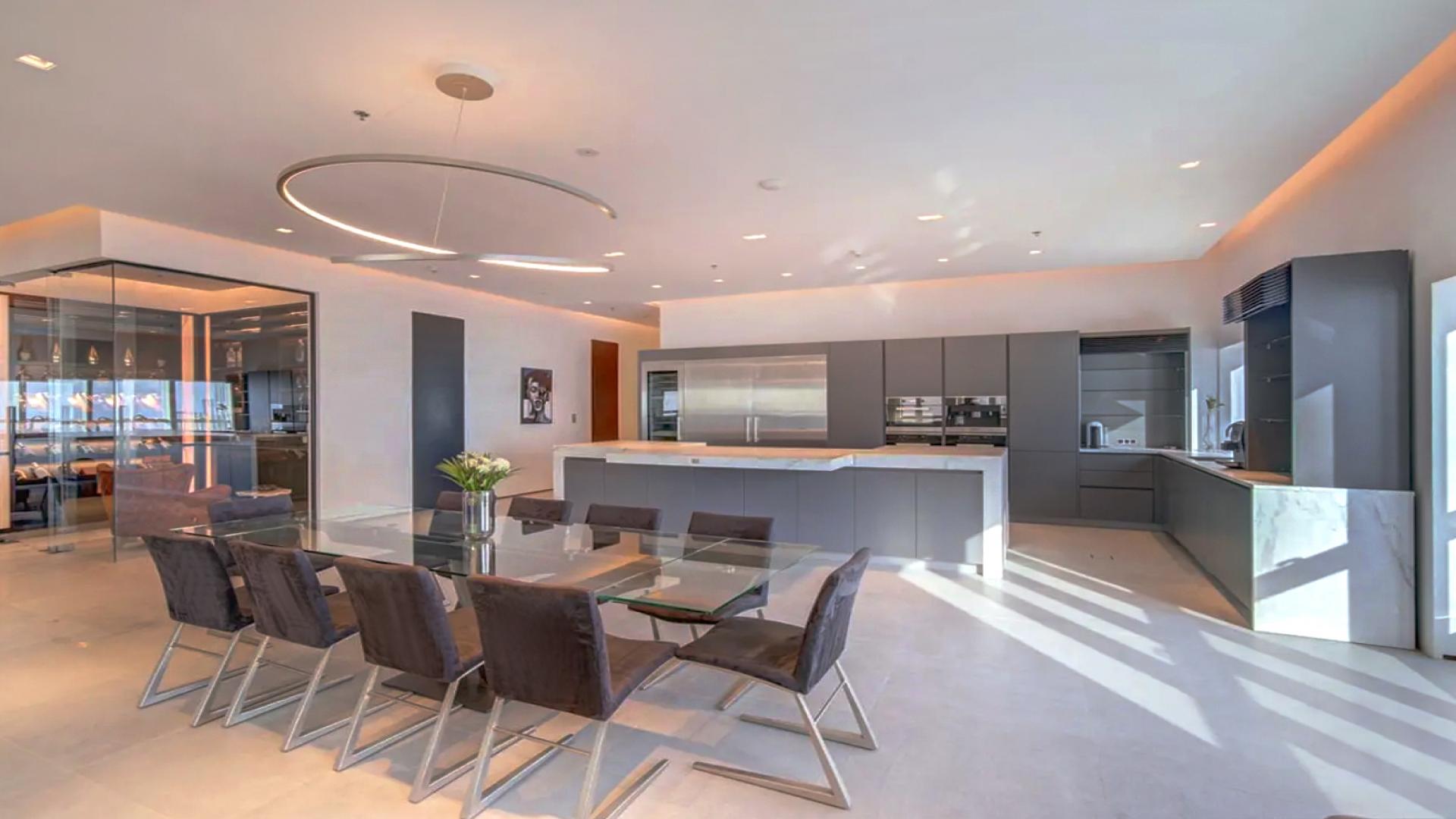 High-floor penthouse balcony view overlooking Palm Jumeirah, Dubai Marina, Elite Residence