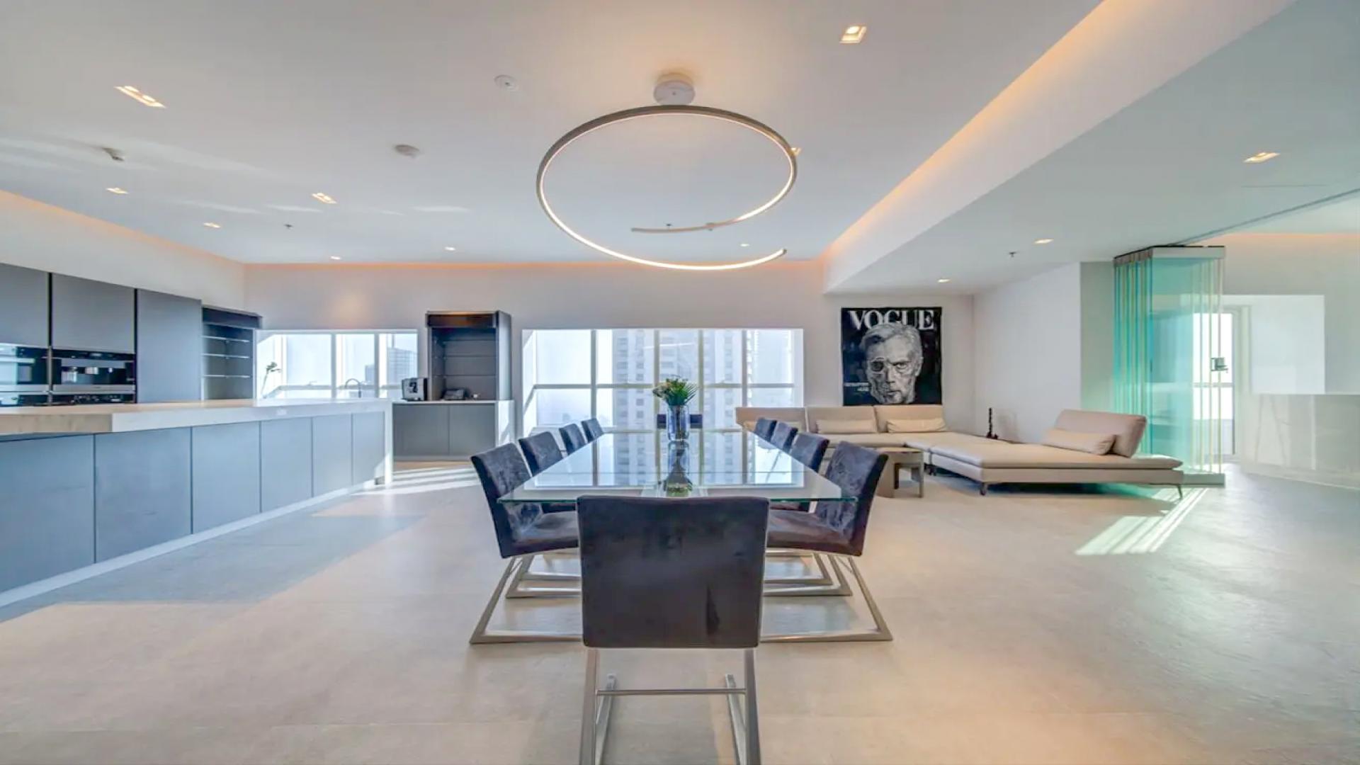 Luxurious high-floor penthouse kitchen and dining area in Elite Residence, Dubai Marina