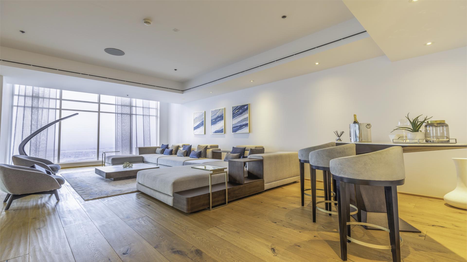 Luxurious Dubai Marina penthouse interior with elegant seating and modern decor, Emirates Crown