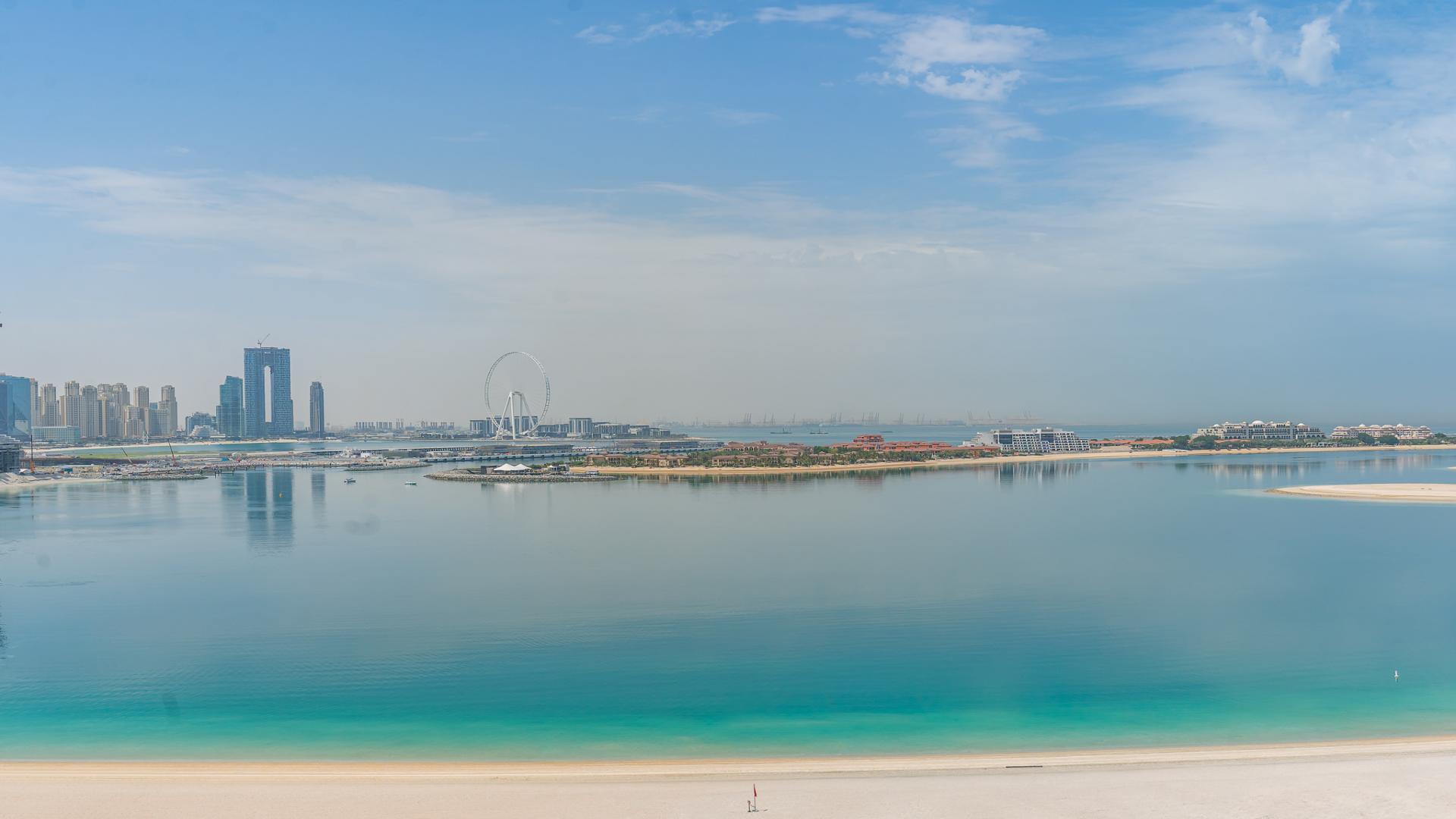 Luxurious living room in Fairmont penthouse, Palm Jumeirah, with sea and skyline views