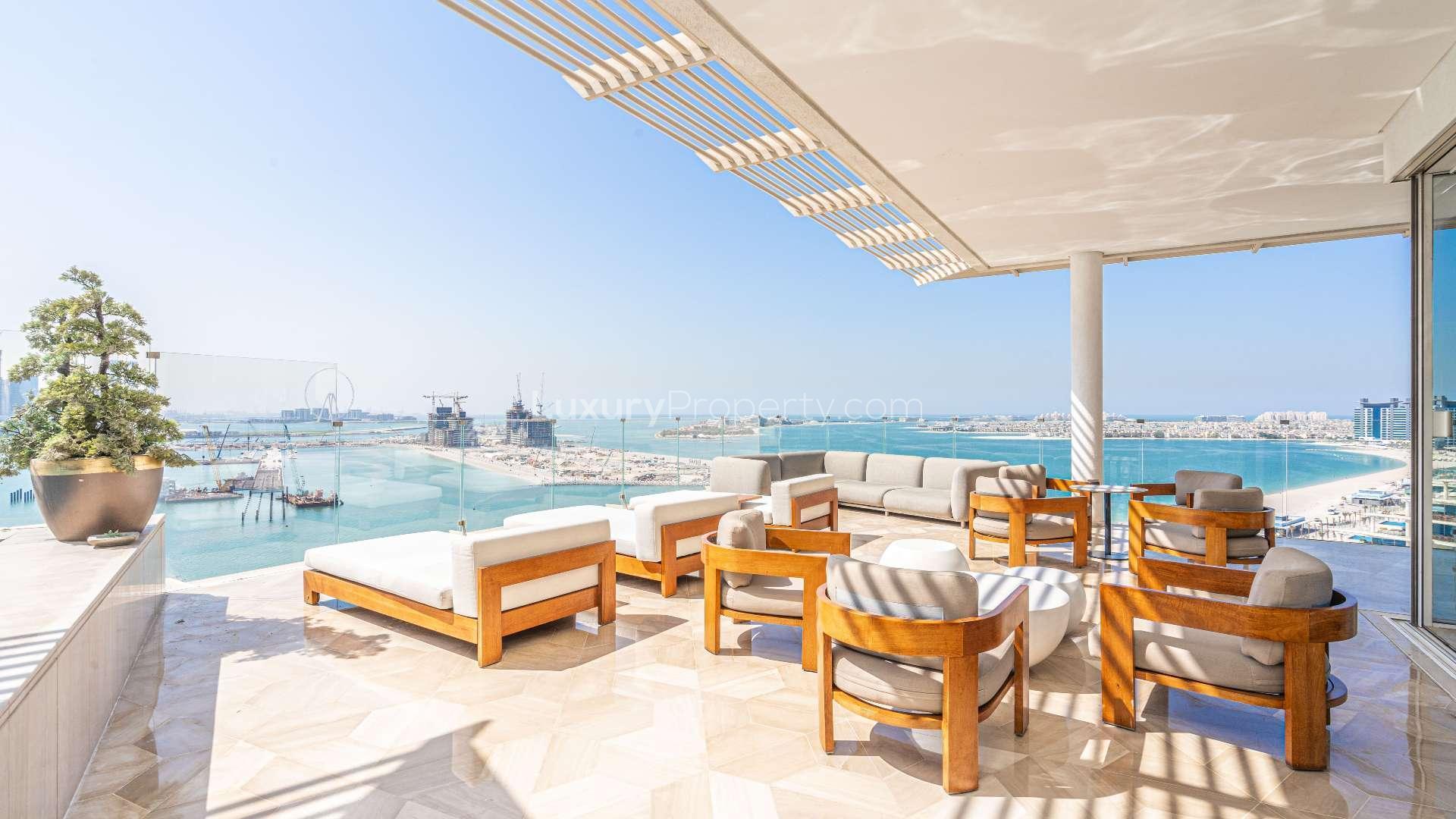 Luxurious penthouse terrace with private pool and stunning Palm Jumeirah sea and skyline views
