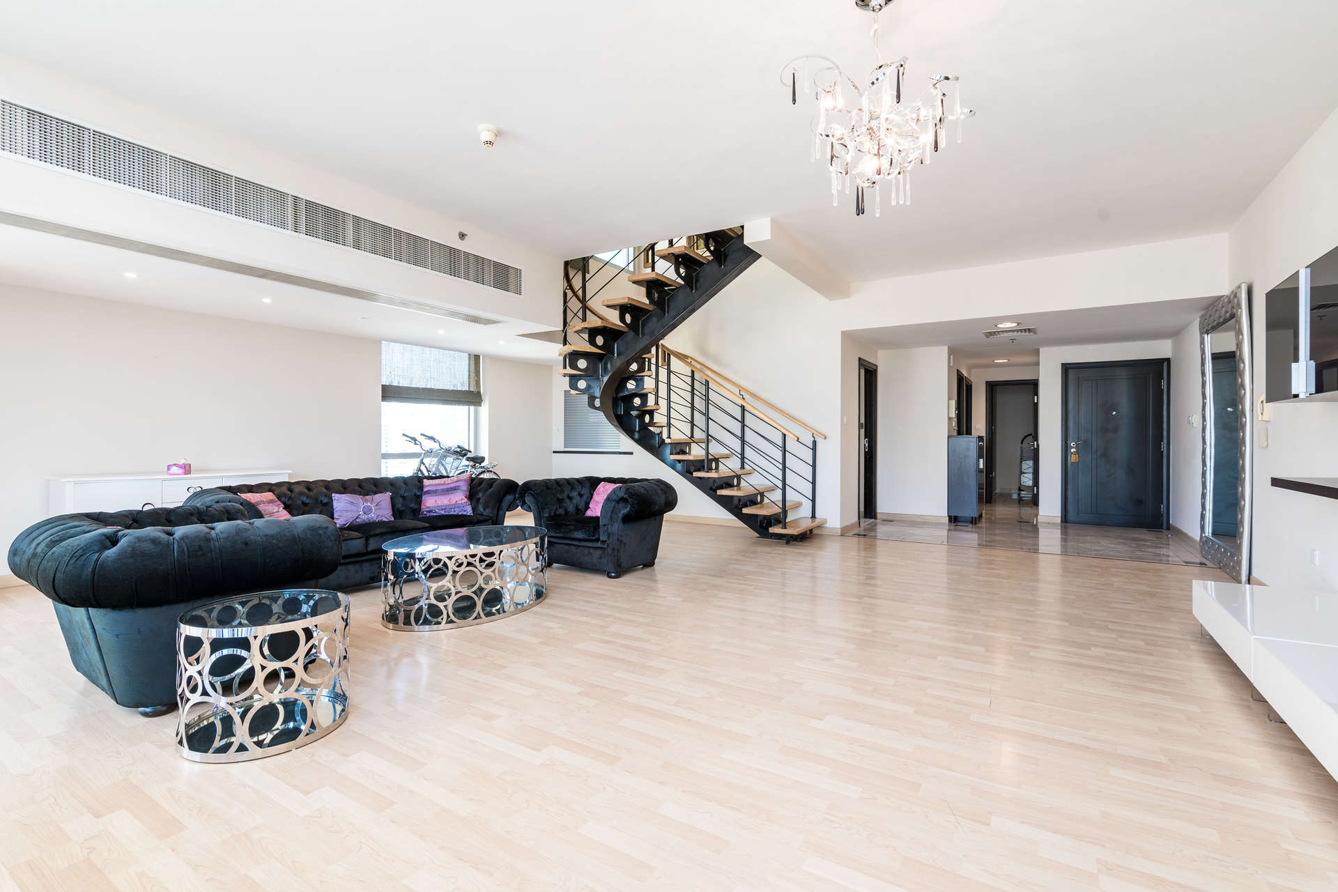 Bedroom in 4-bedroom duplex penthouse, La Riviera Tower, Dubai Marina, with closet and sofa