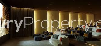 Luxurious dining area in contemporary Lincoln Square penthouse, London with elegant decor and lighting