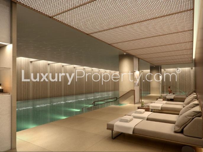 Luxurious living area in Lincoln Square penthouse, London with modern seating arrangement