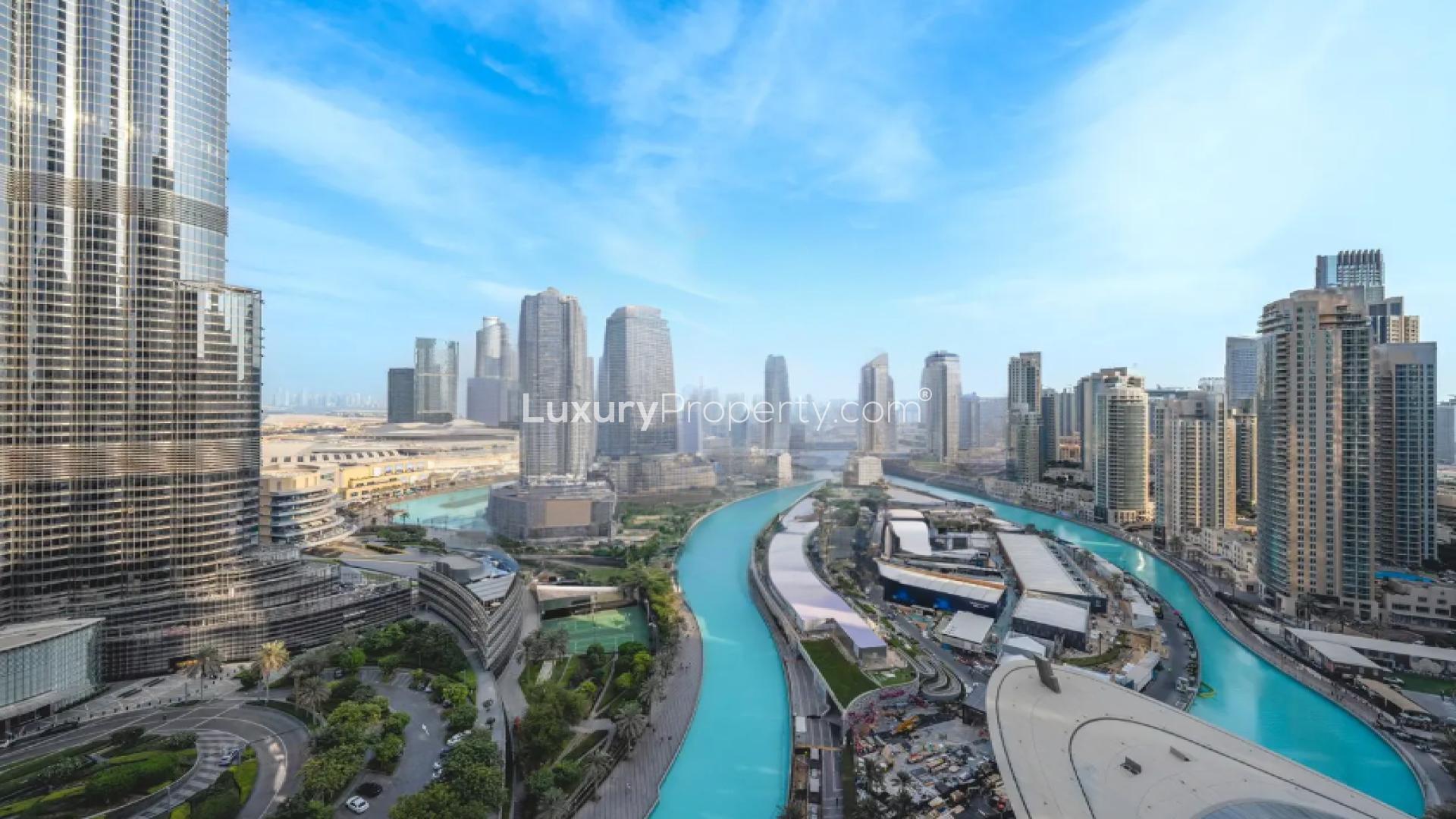 Spacious IL Primo penthouse with city skyline view, marble floors, and modern ceiling design