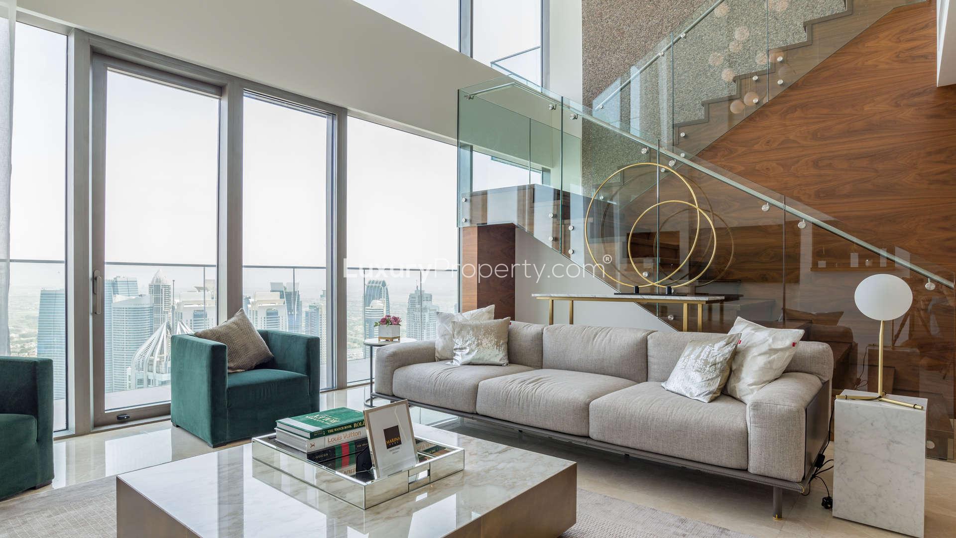 Contemporary open-plan living area in Marina Gate duplex penthouse, Dubai Marina