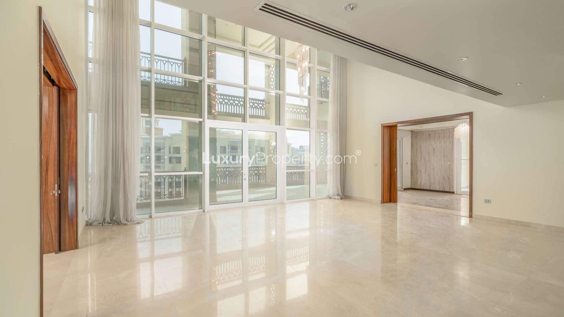 Furnished duplex penthouse interior with chandelier and Atlantic view in Marina Residences