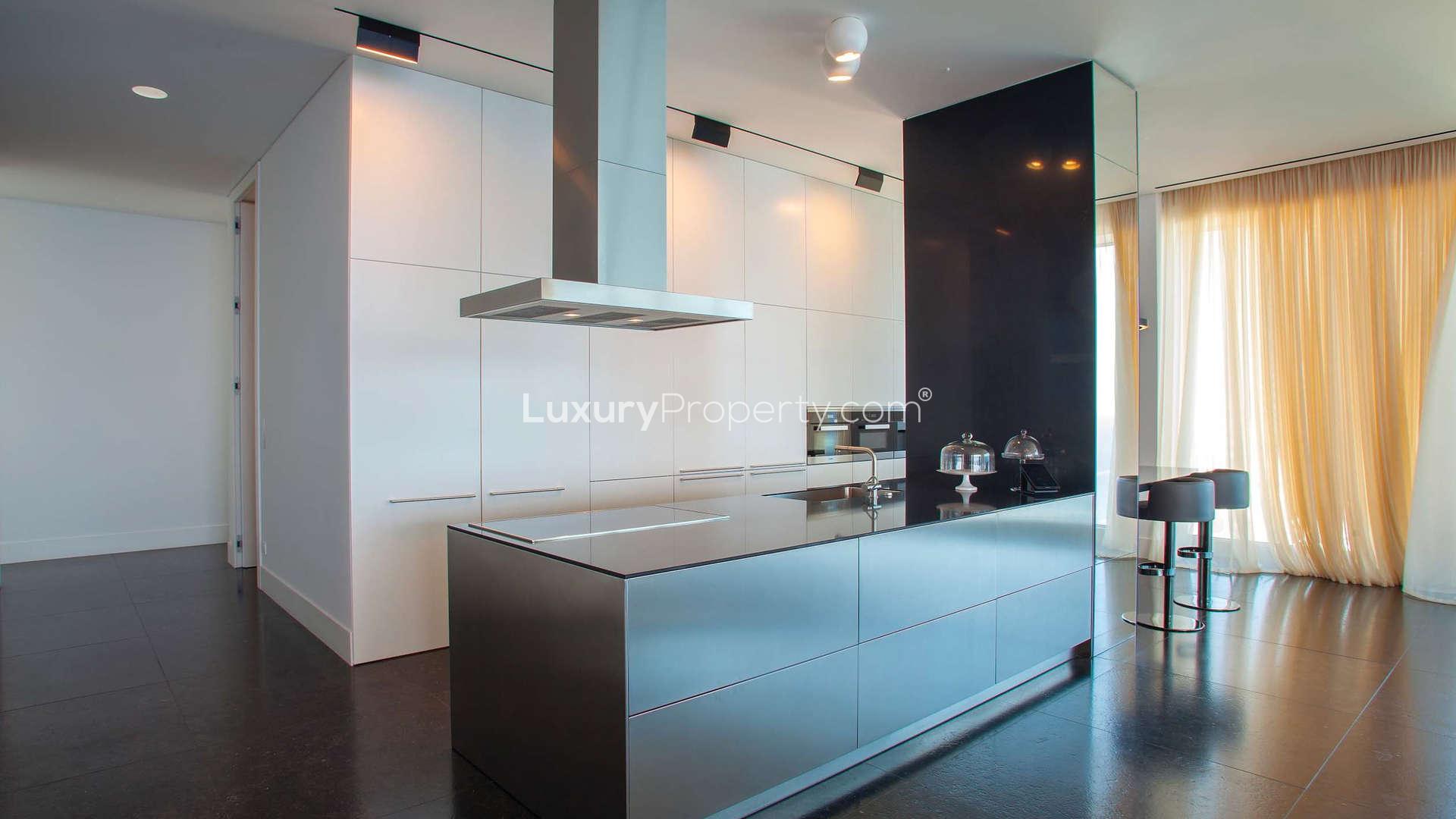 Luxurious penthouse dining area with city views in Olympic Residence, Limassol