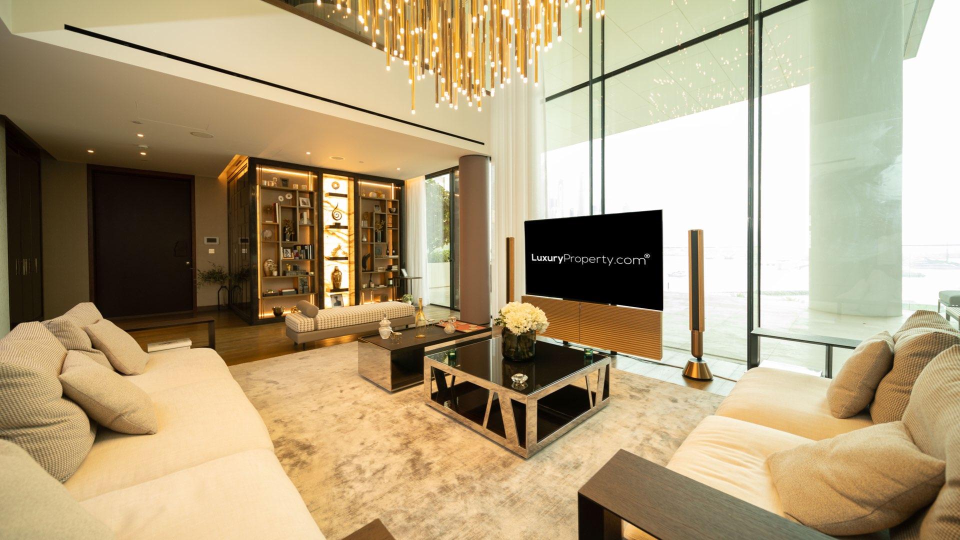 Luxurious living room in One Palm duplex penthouse, Palm Jumeirah, with modern decor