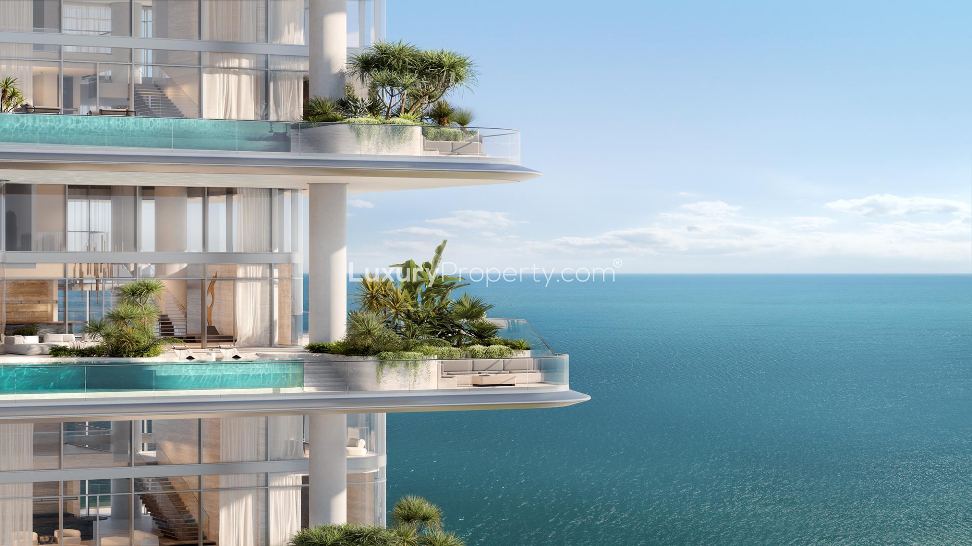 Luxurious Orla Infinity penthouse exterior at sunset, Palm Jumeirah beachfront