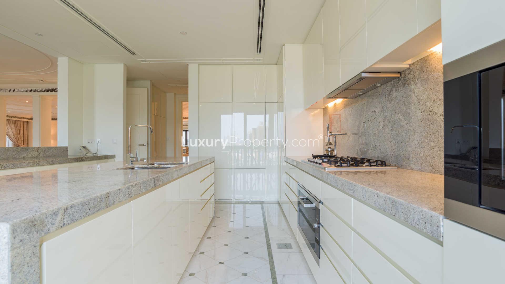 Elegant bedroom in four-bedroom penthouse, Palazzo Versace, Culture Village, featuring luxurious decor