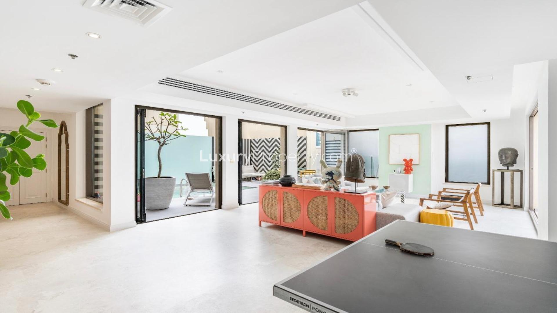 Luxurious JBR Shams 1 penthouse terrace with stunning sea views and elegant seating