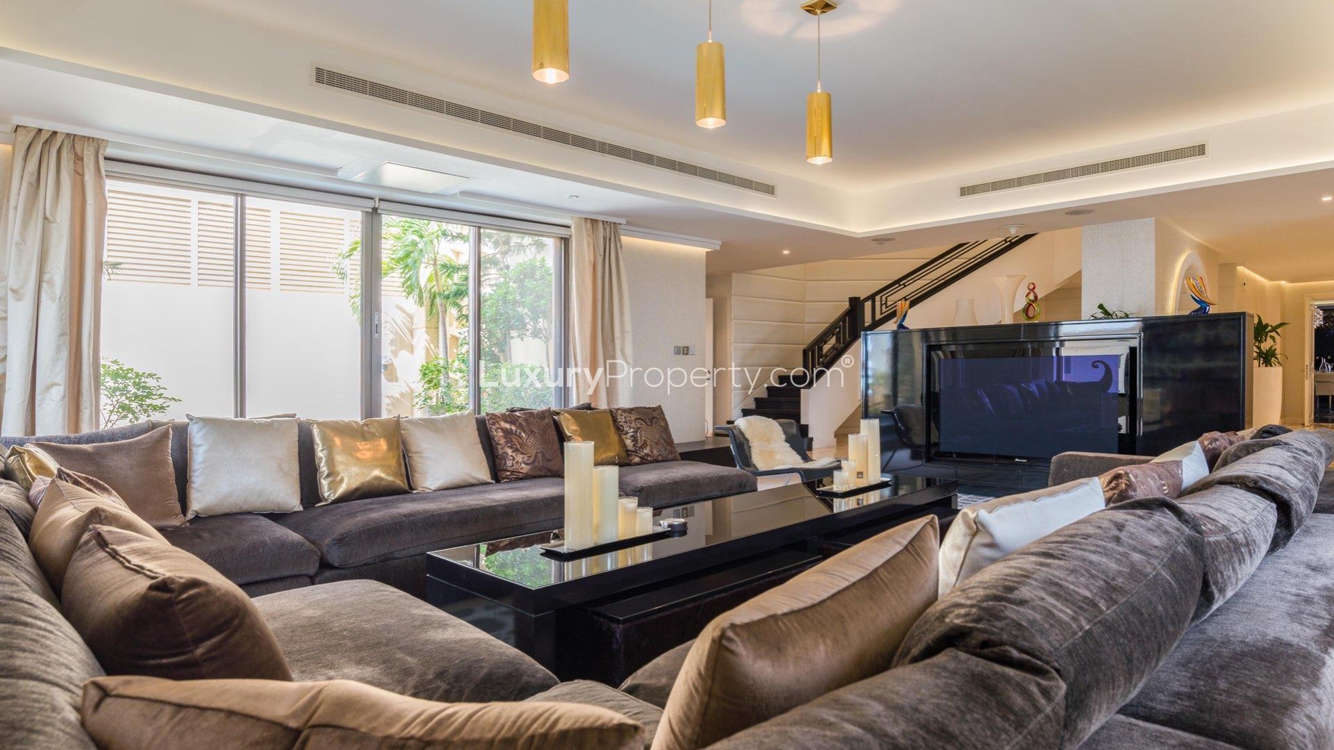 Luxurious Jumeirah Beach Residence penthouse with pool table and elegant dining area