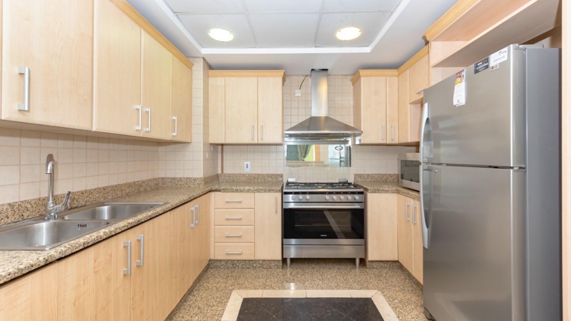 Luxurious duplex penthouse living room with marble flooring in Palm Jumeirah, Shoreline Apartments