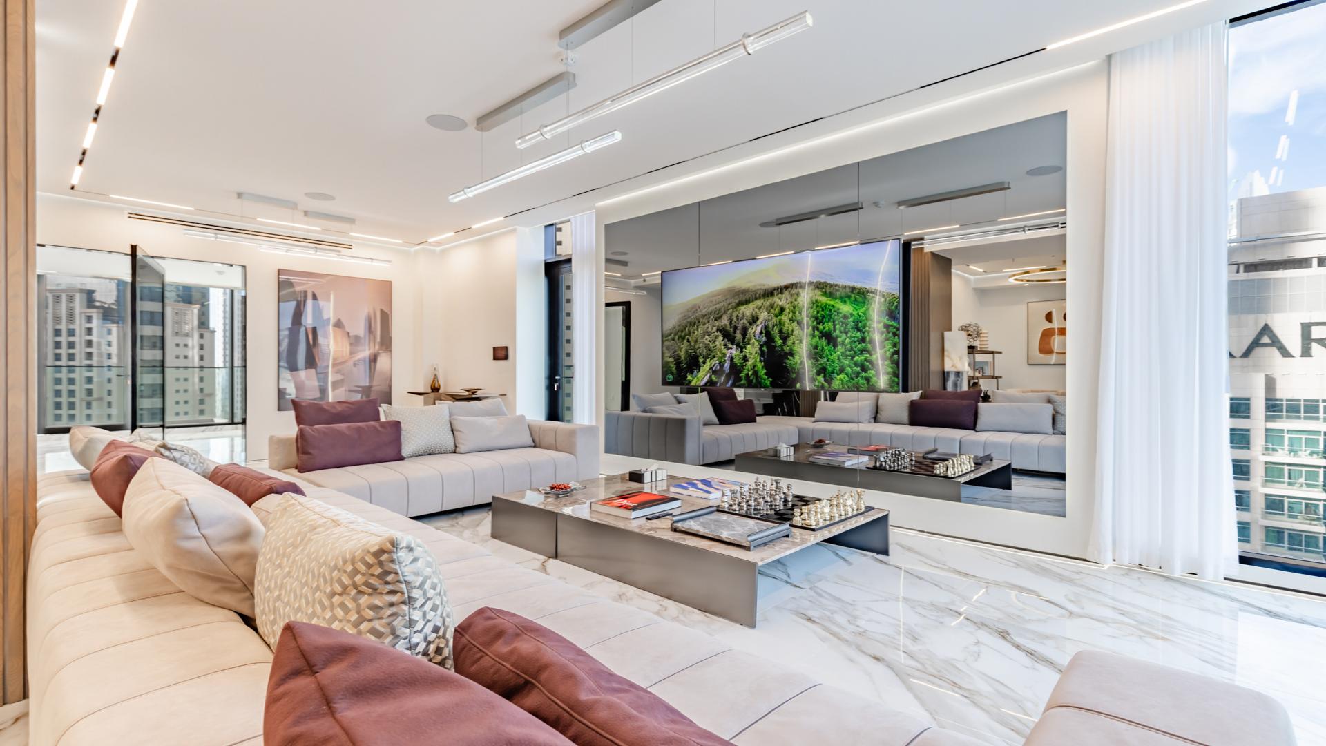 Luxurious living room in high-floor penthouse, LIV Residence, Dubai Marina, with city views