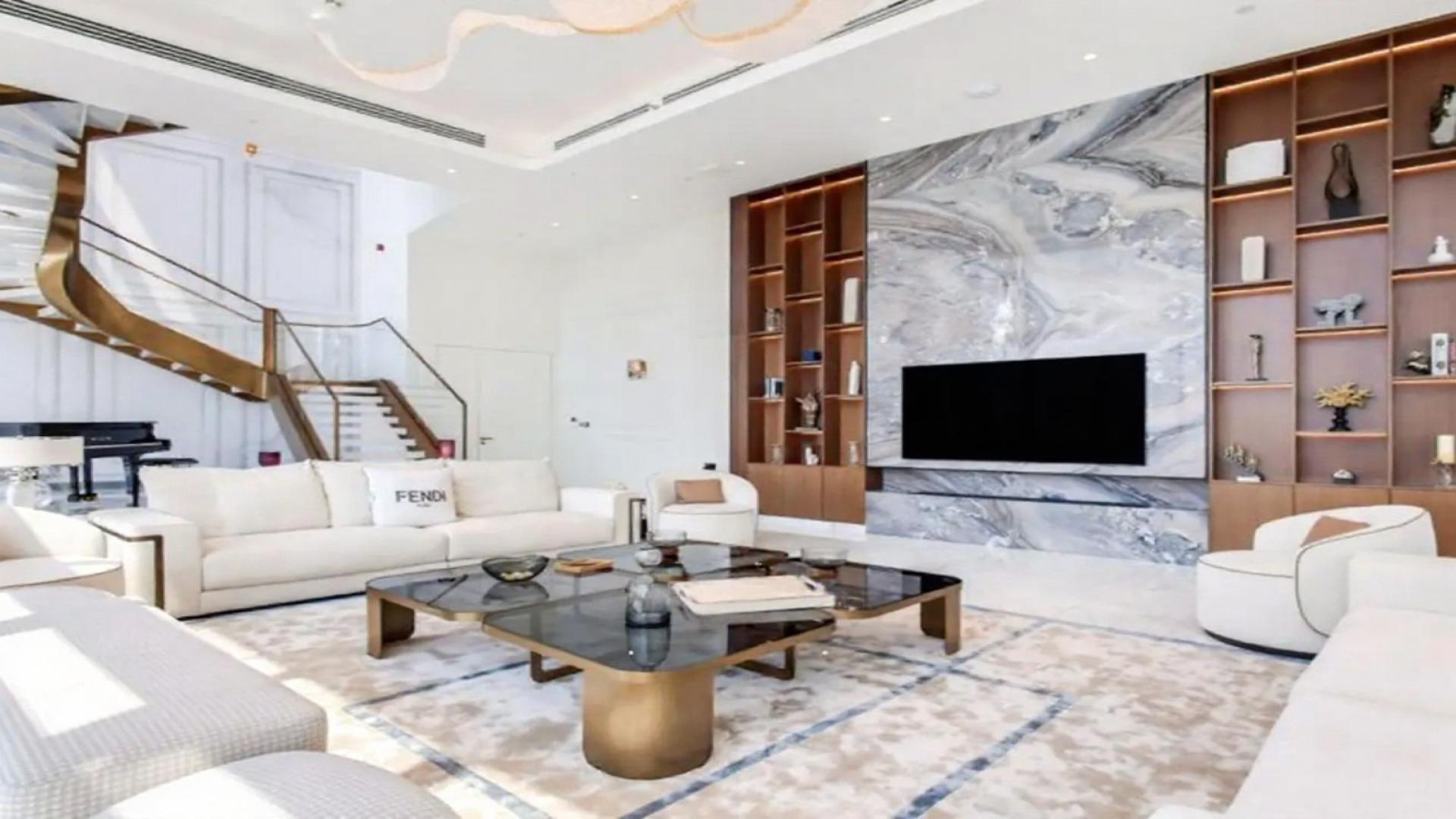 Luxurious penthouse living room with city views in Downtown Dubai's Kempinski BLVD