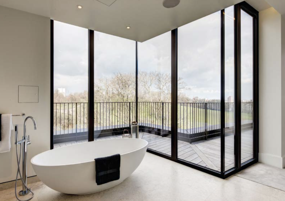 Luxurious bedroom in four-bedroom penthouse, St. Edmund's Terrace, London, with modern decor