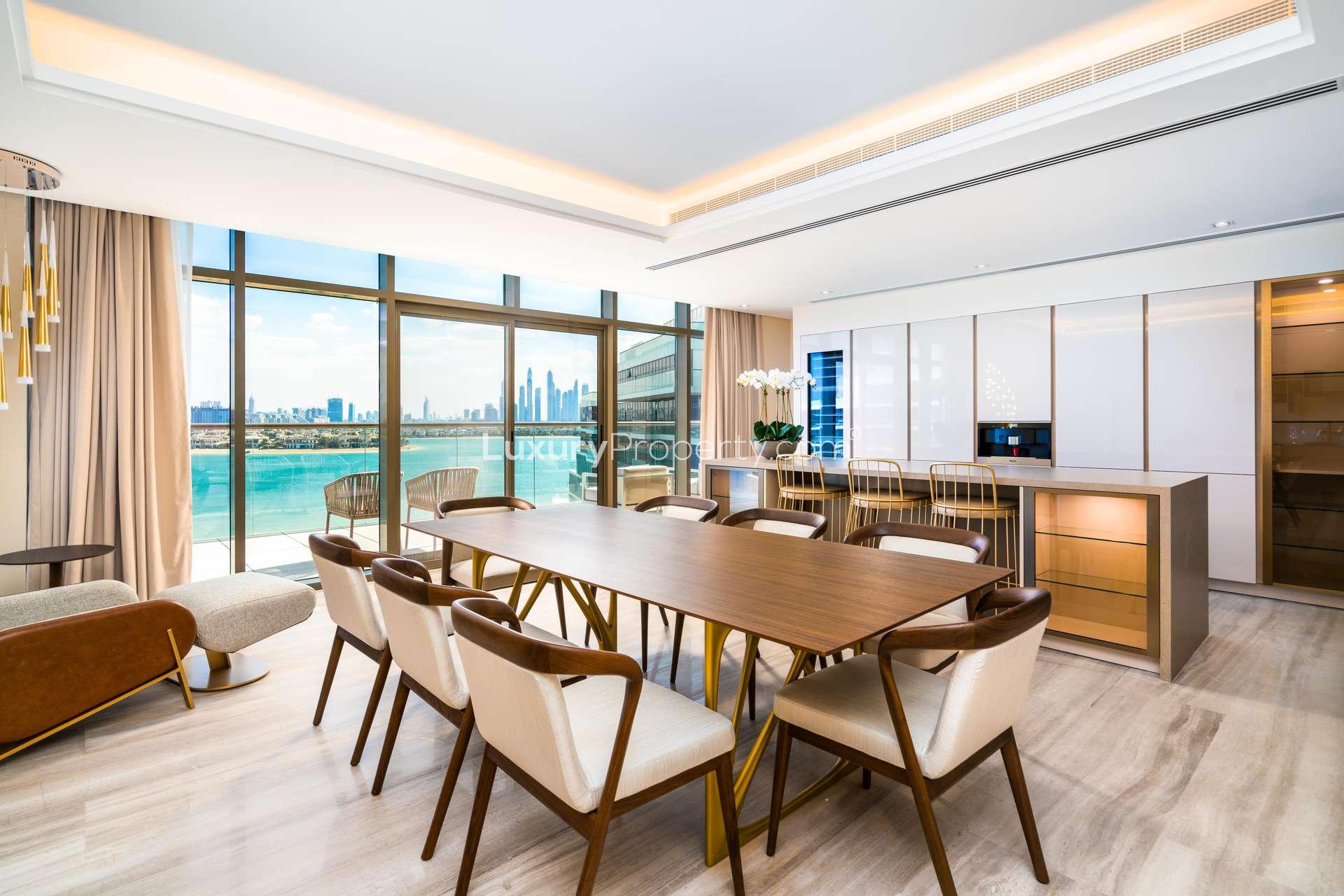 Panoramic view from 4-bed penthouse at THE8, Palm Jumeirah, overlooking beachfront and skyline