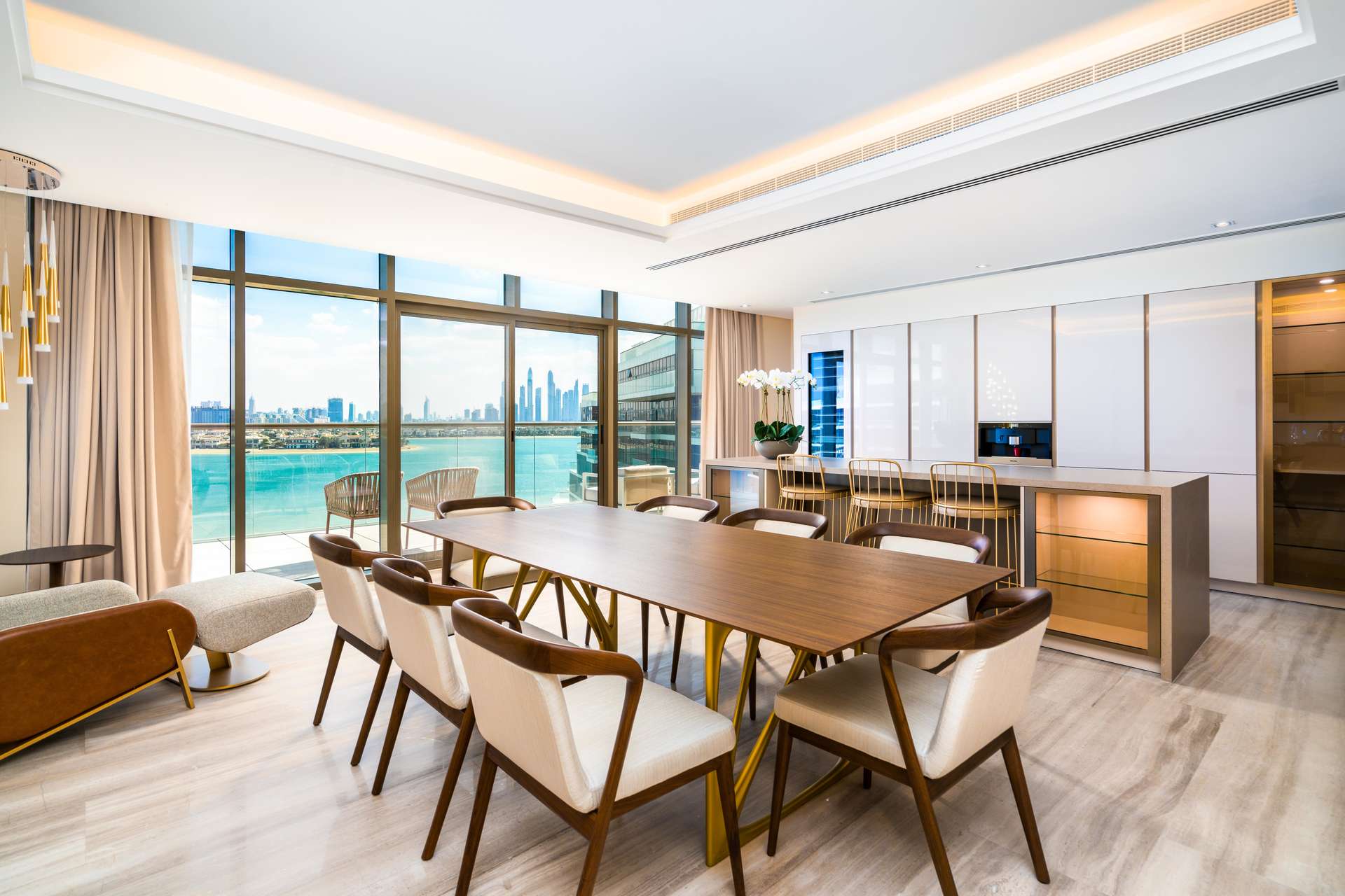 Panoramic view from 4-bed penthouse at THE8, Palm Jumeirah, overlooking beachfront and skyline