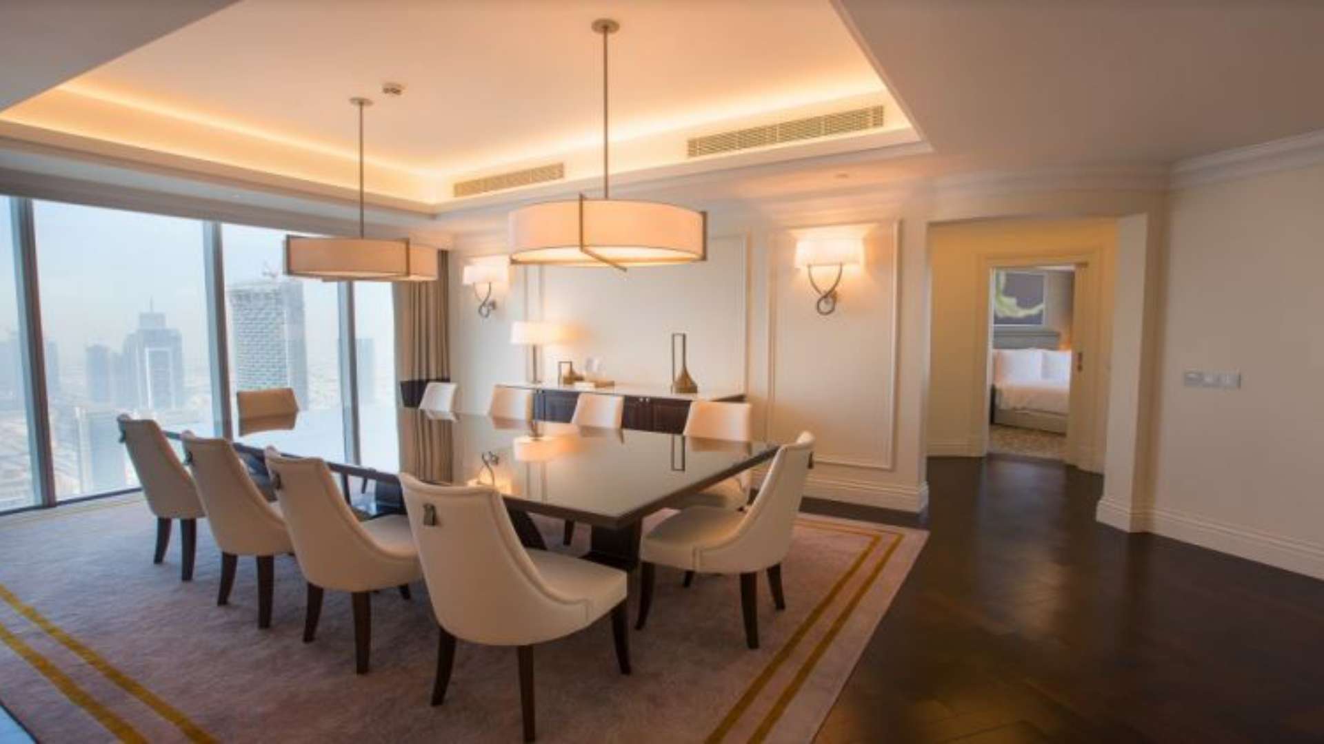 Luxurious penthouse living area with elegant dining space, Downtown Dubai, Burj Khalifa views