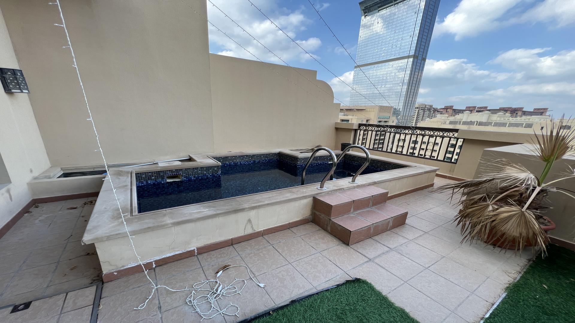 Luxurious Fairmont Palm penthouse interior with elegant columns and sea view windows