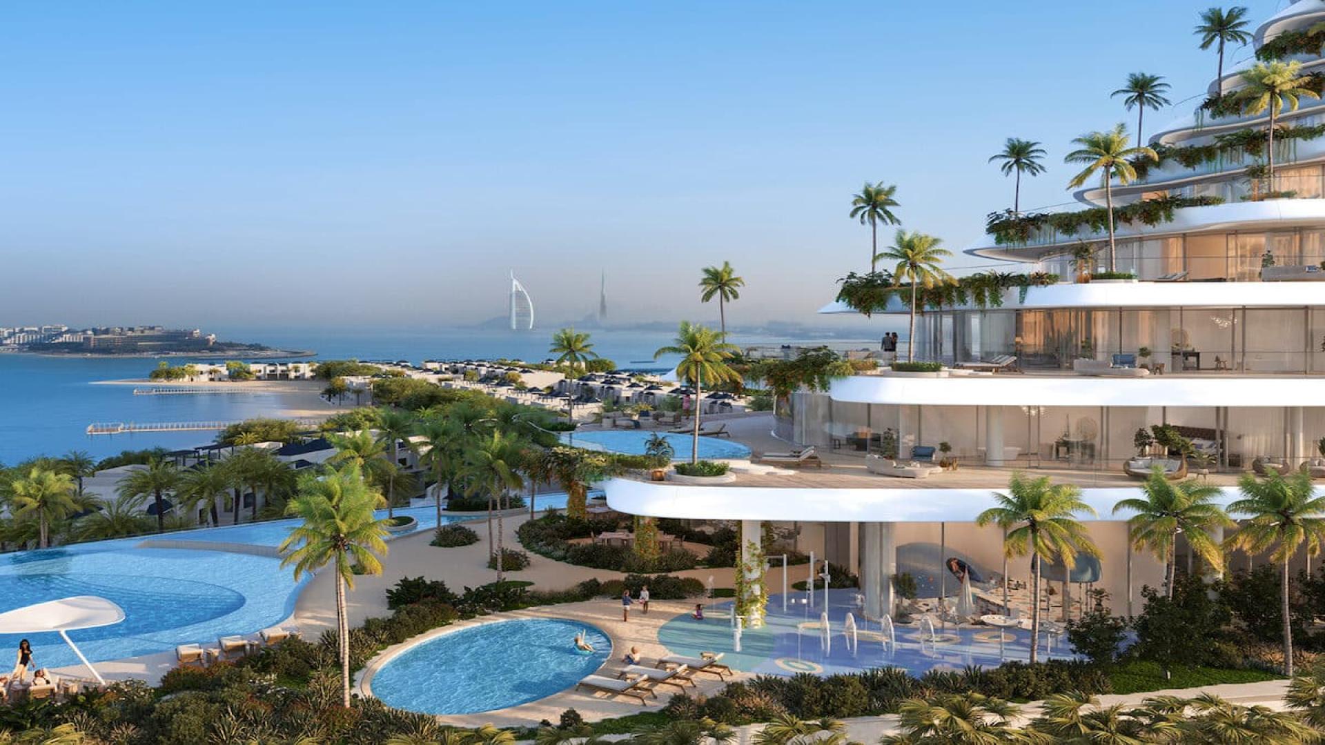 Luxurious Como Residences penthouse living room with spiral staircase in Palm Jumeirah