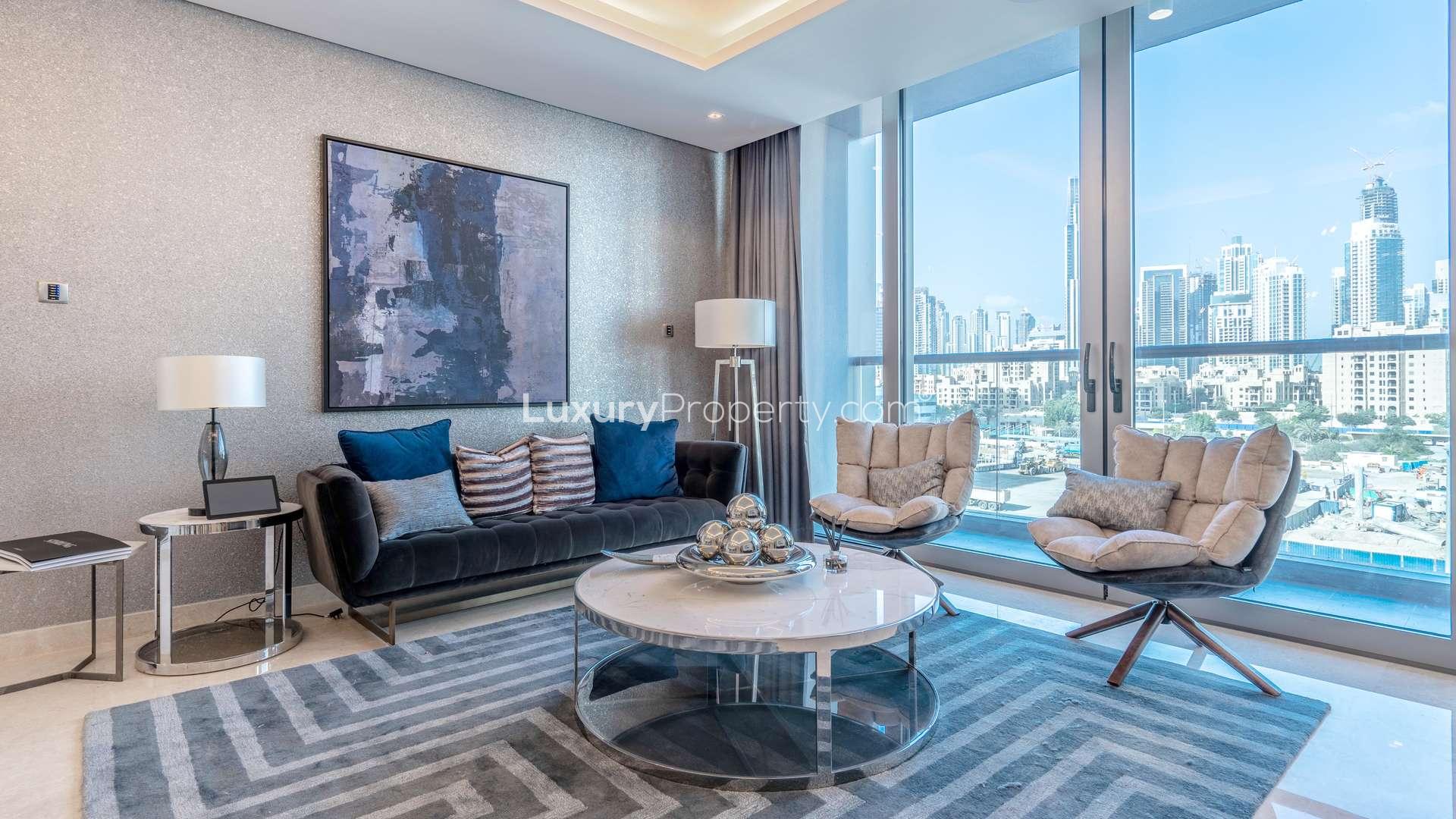 Luxury penthouse living room with modern decor and stunning Downtown Dubai skyline views