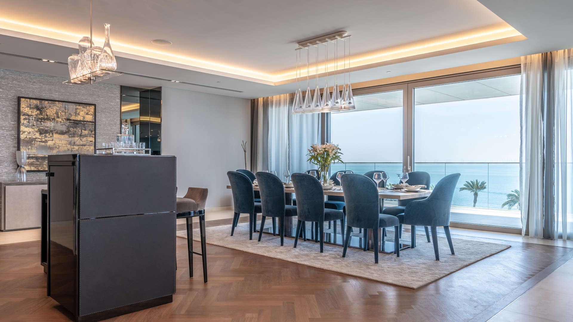 "Elegant dining area in duplex penthouse at W Residences, Palm Jumeirah with ocean view.",Elegant dining area with ocean view in duplex penthouse, W Residences, Palm Jumeirah