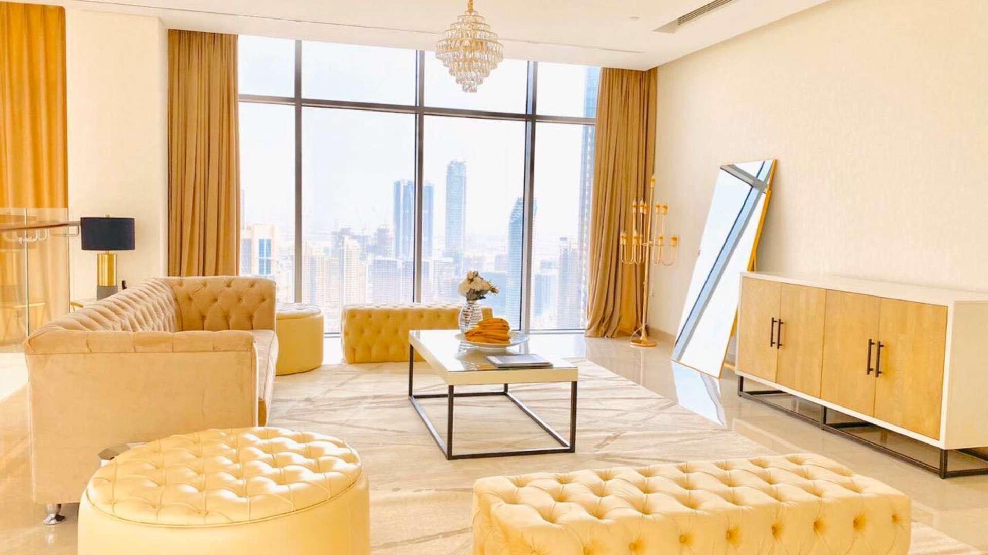 Contemporary split-level penthouse interior with open-plan living area in Downtown Dubai