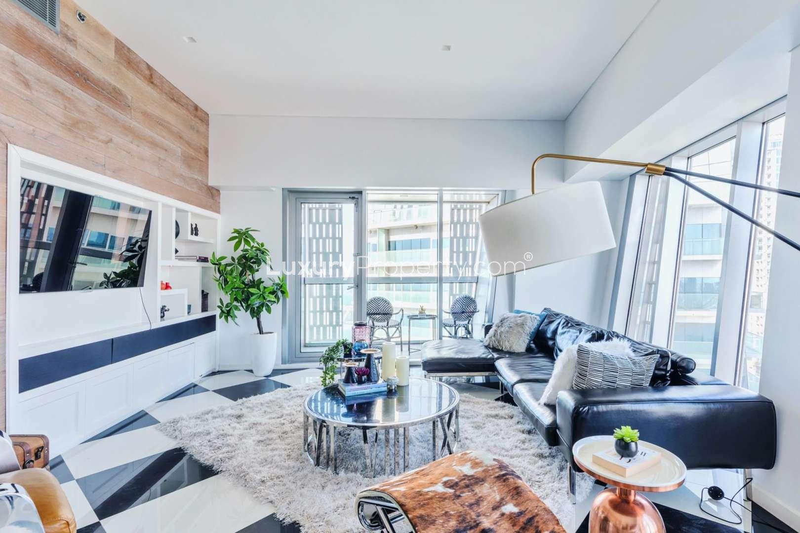 Modern interior of Dubai Marina penthouse with plants and elegant decor in Cayan Tower