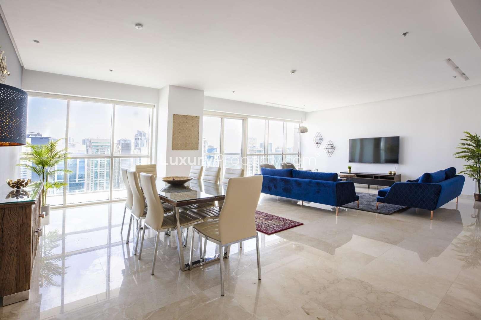 Luxurious living room in 4-bedroom Dubai Marina penthouse with city views