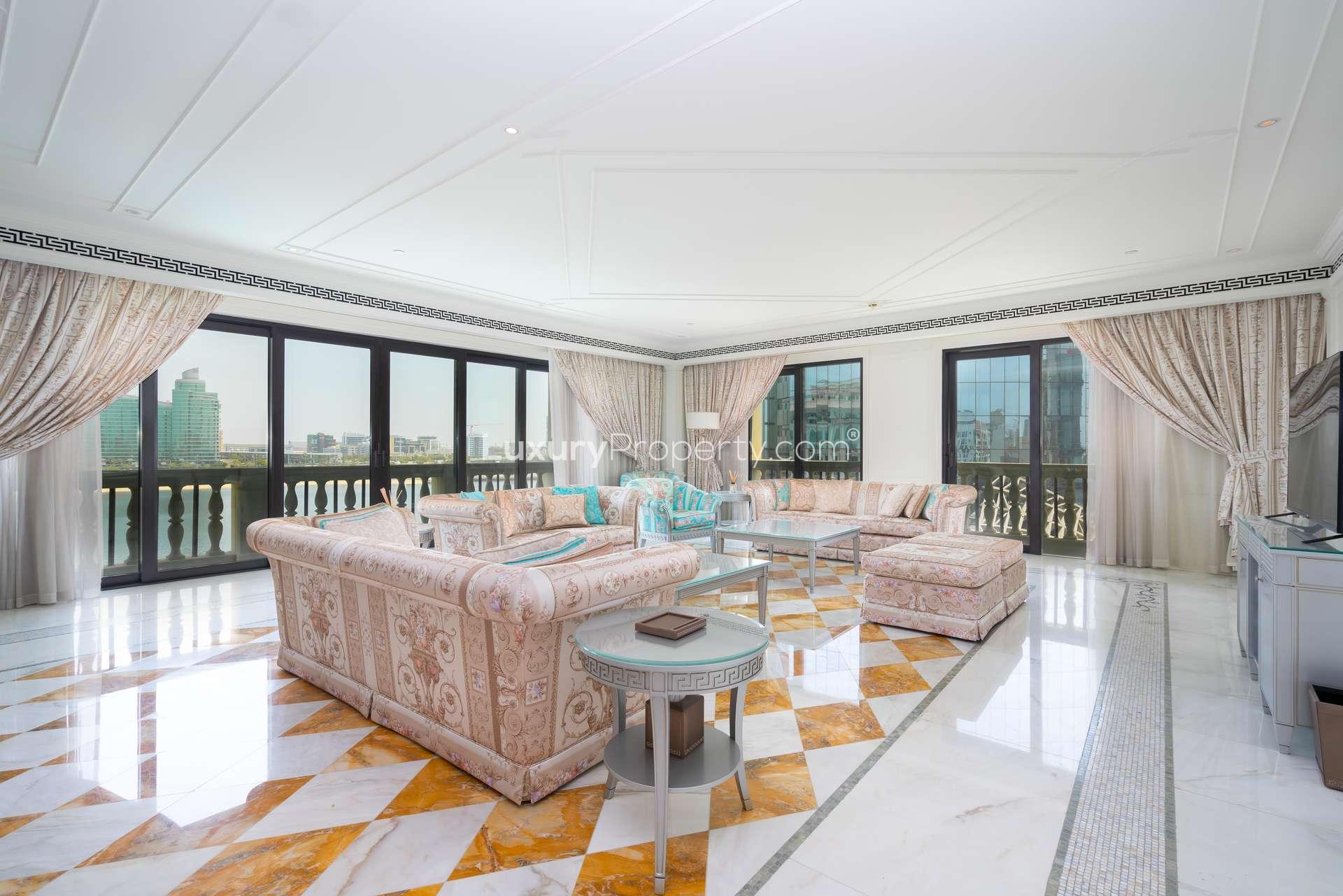 Furnished living room in Palazzo Versace apartment, Culture Village, with creek view and elegant decor