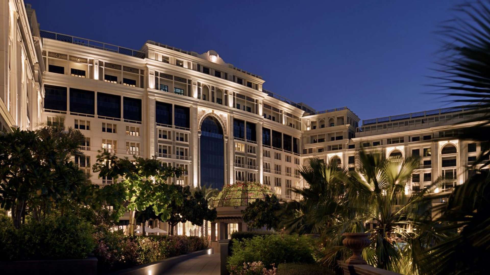 "Luxury Palazzo Versace Hotel exterior view at night, Culture Village waterfront location.",Luxurious four-bedroom apartment at Palazzo Versace Hotel, Culture Village, for sale