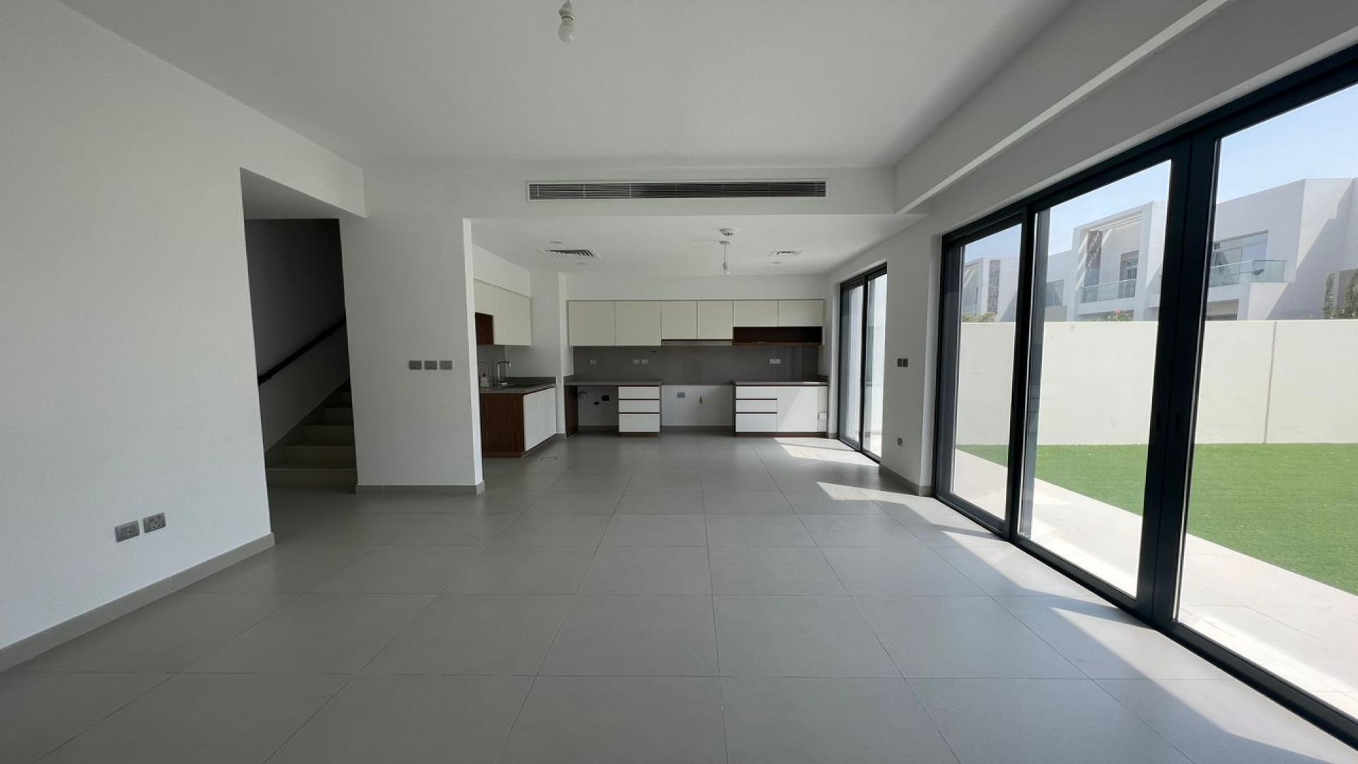 Vacant townhouse garden with seating area in Arabian Ranches 2, Camelia community