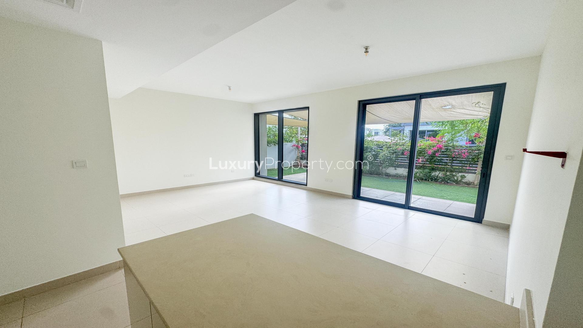 Bright living room with garden view in Maple 3 townhouse, Dubai Hill Estate