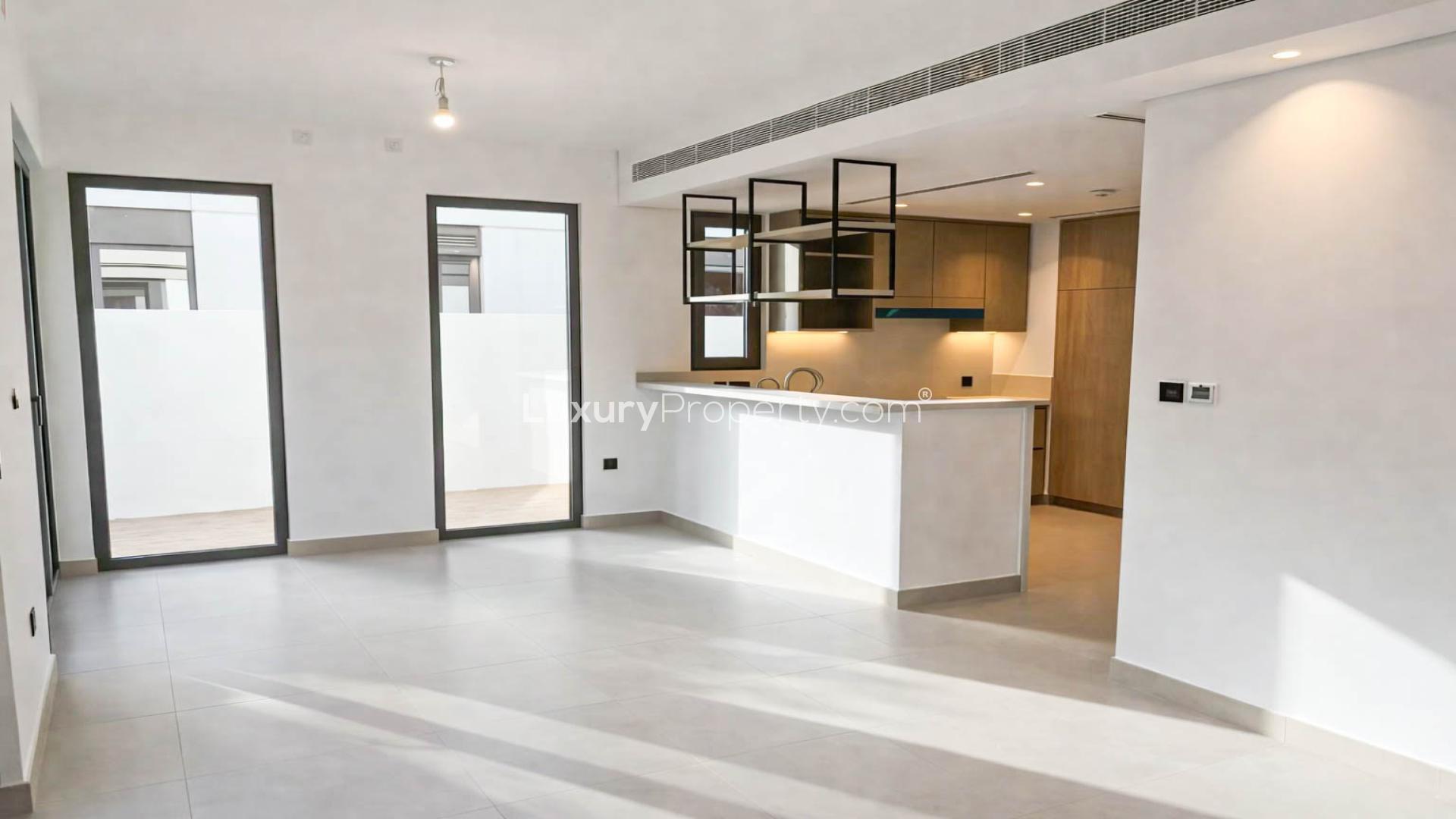 Beautifully landscaped backyard of a single row townhouse in Aura Gardens, Tilal Al Ghaf