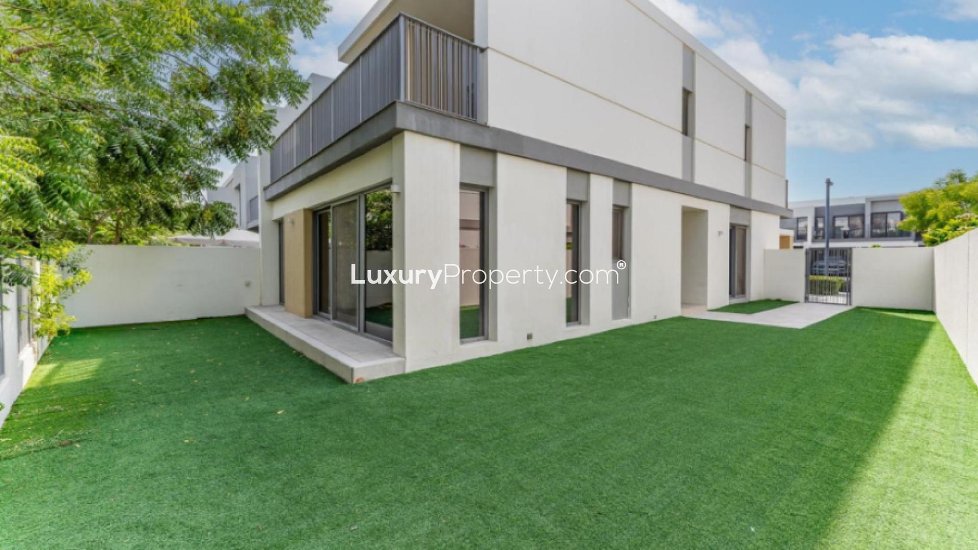 Modern living room with large windows in 4 BHK villa, Tilal Al Ghaf, Elan 1
